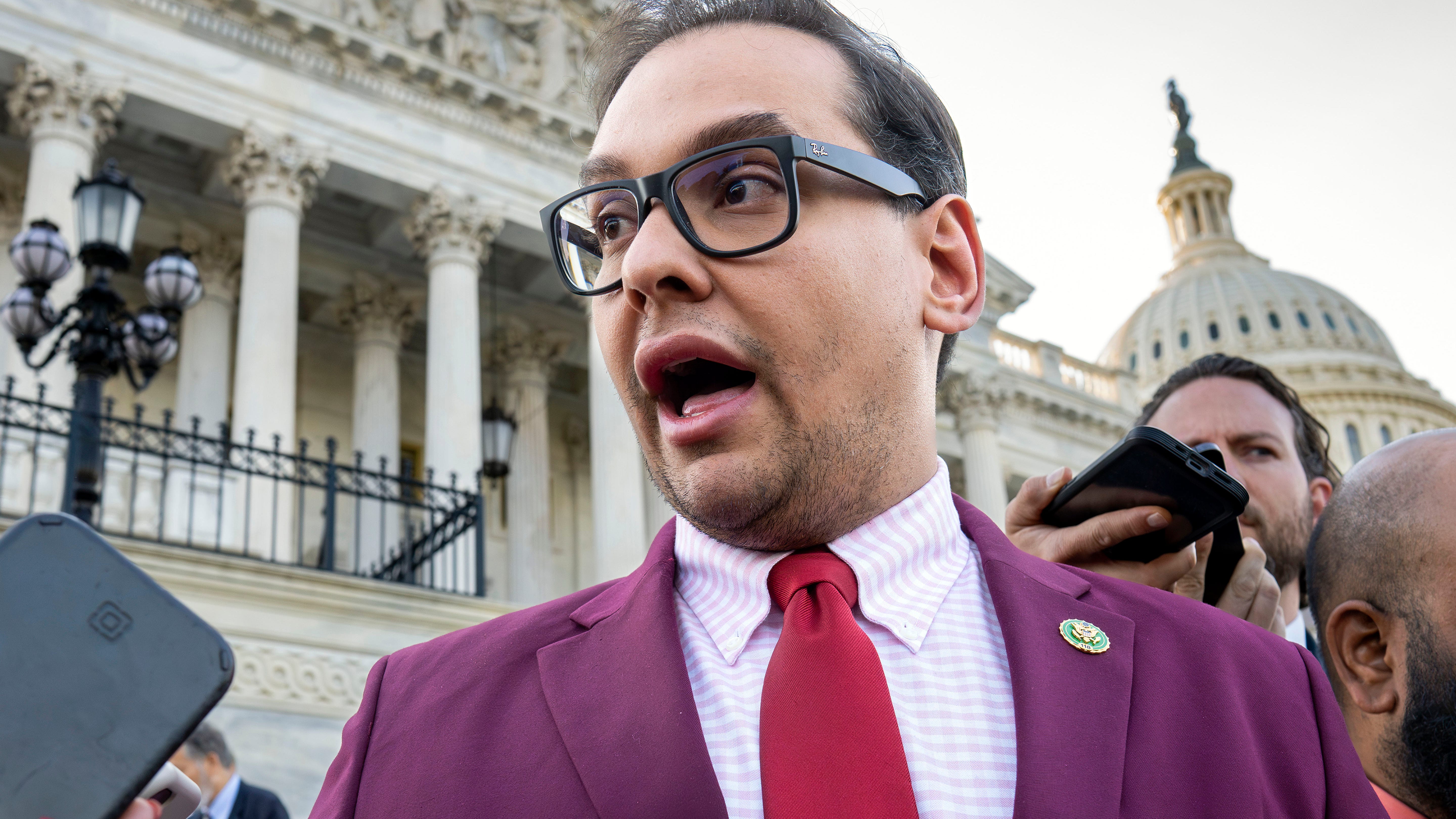 Rep. George Santos' aunt and dad signed his bail bond to keep him out of jail while awaiting trial