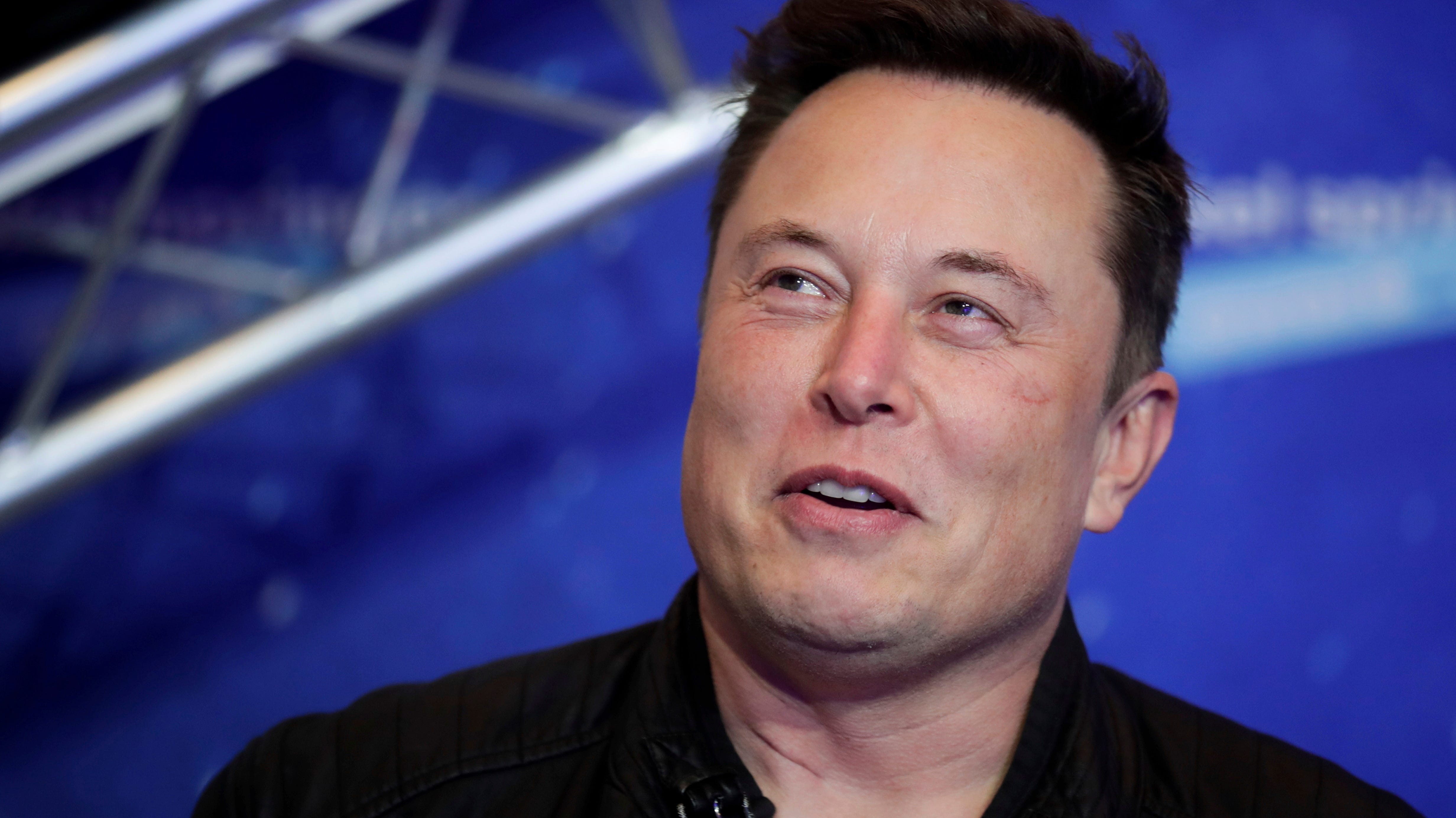 Musk says Twitter in precarious position, defends cost cuts