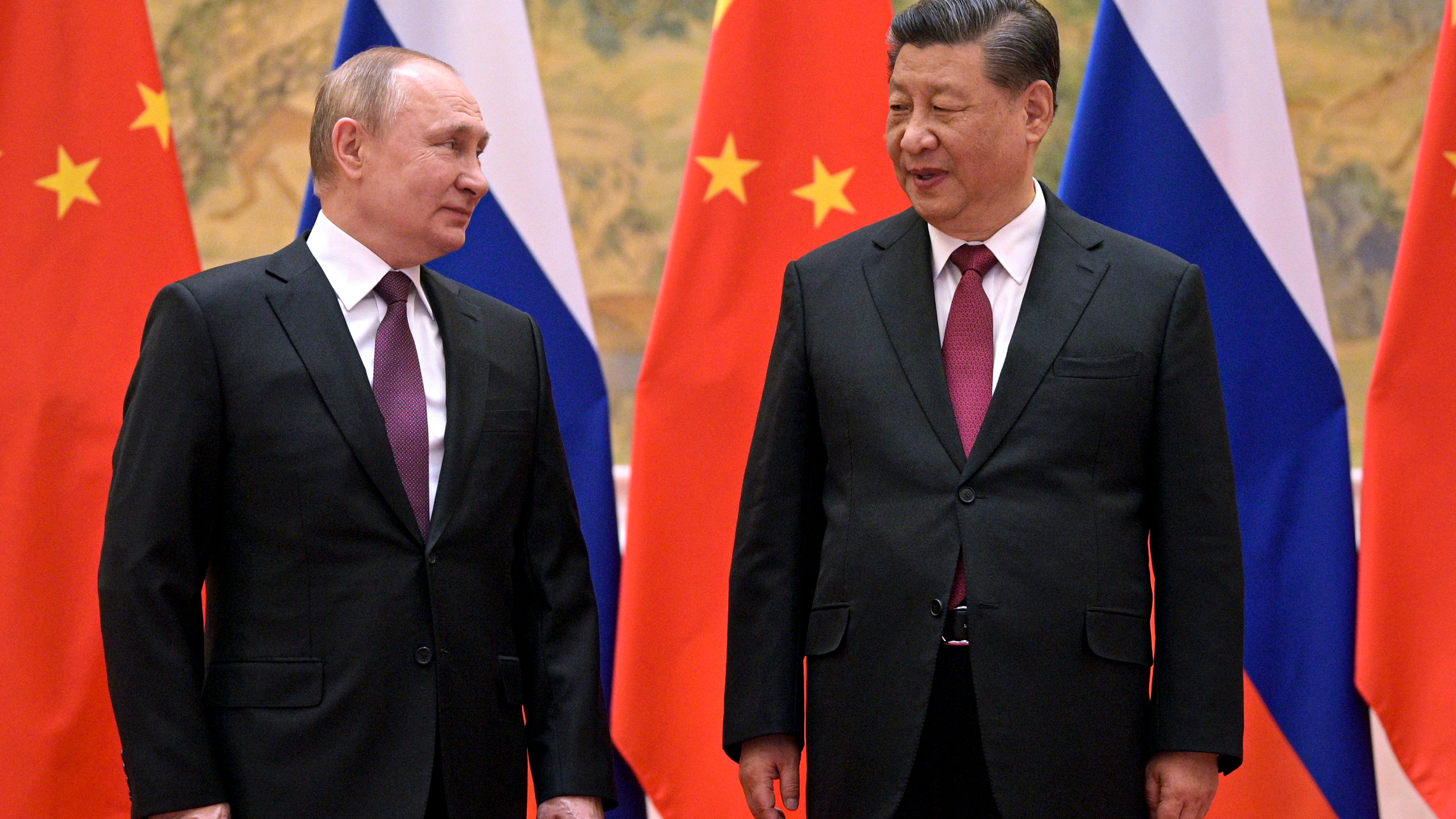 China denies asking Russia not to invade until post-Olympics