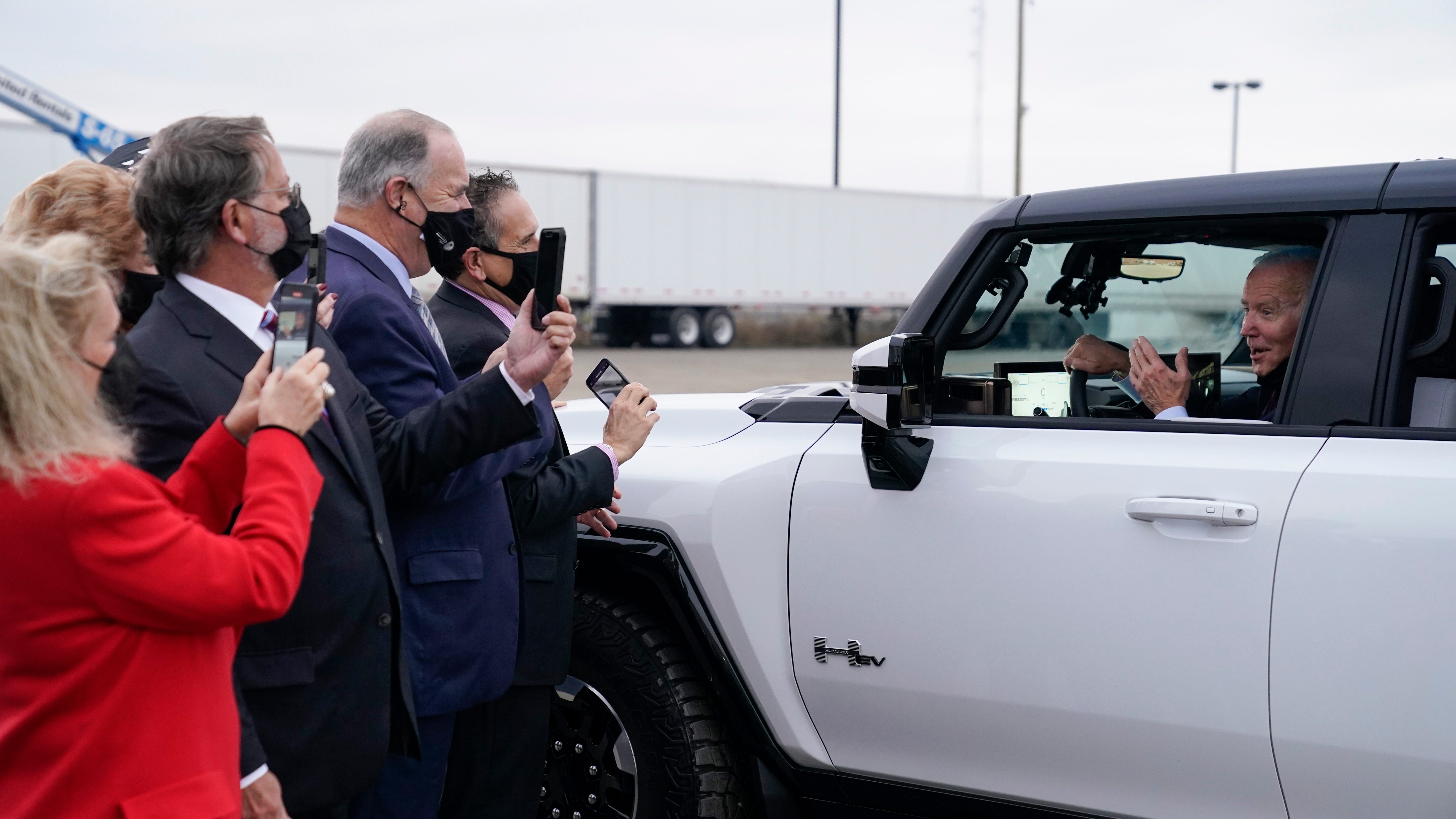 Biden pushes electric vehicle chargers as energy costs spike