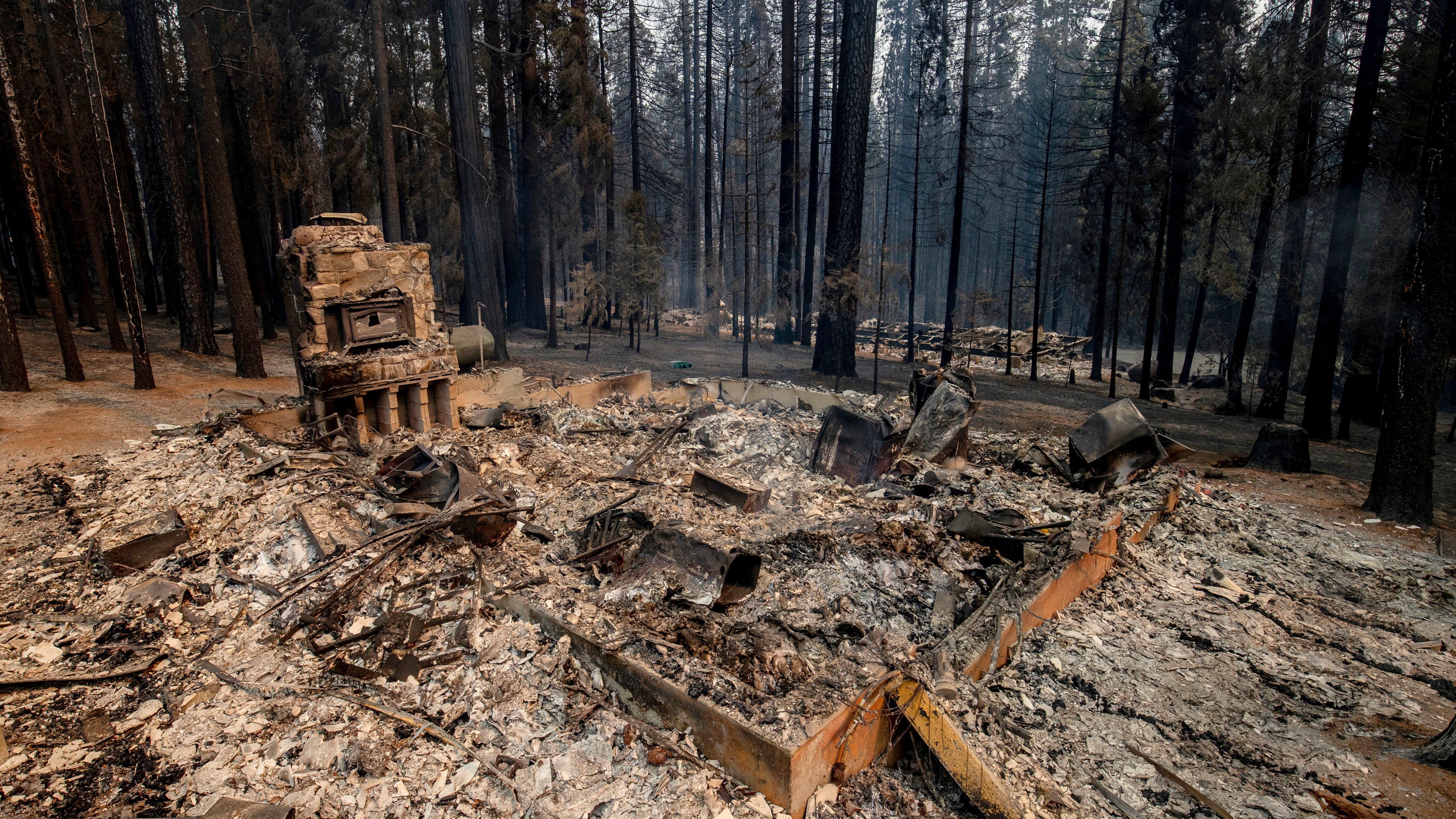 Fueled by winds, largest wildfire moves near California city