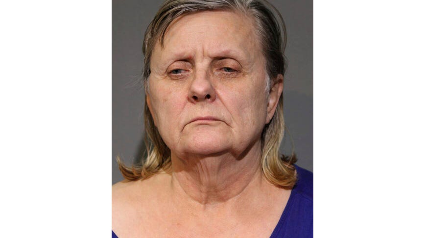 Daughter charged after mom's body found in Chicago freezer