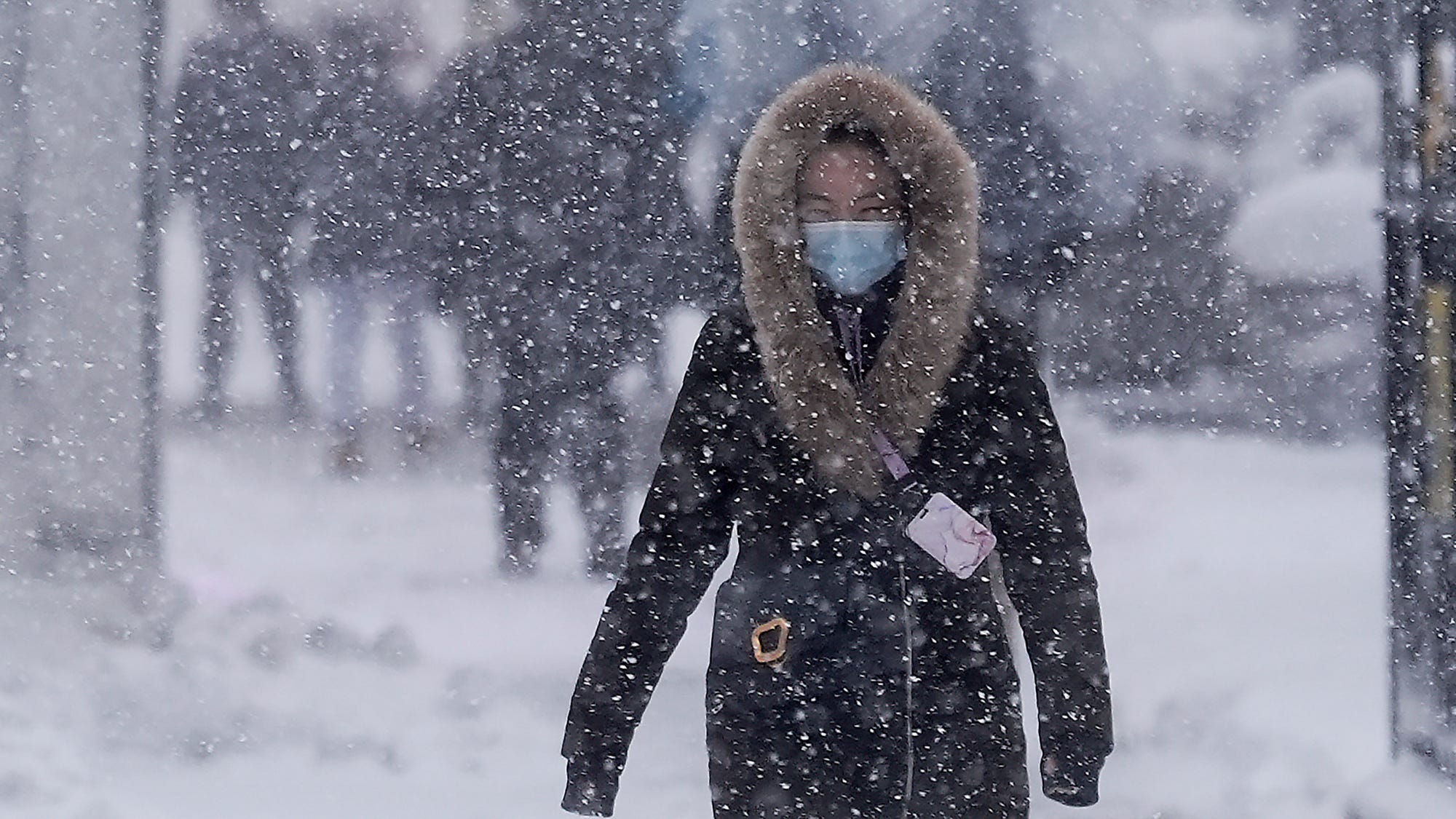 Northeast US digs out from brutal storm that disrupted flights and canceled school