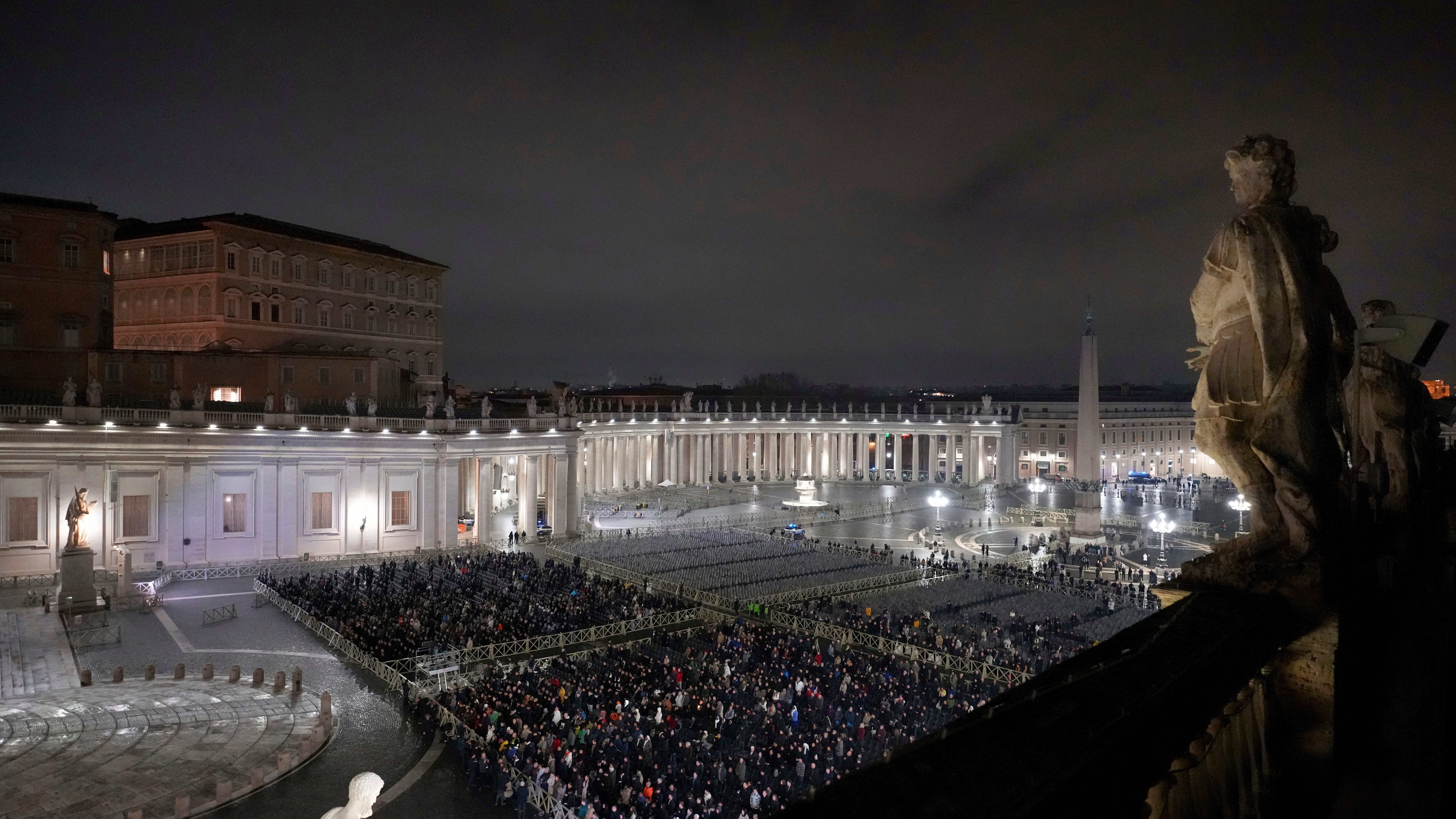 Pope Francis shows slight improvement and resumes some work, while still critical, Vatican says