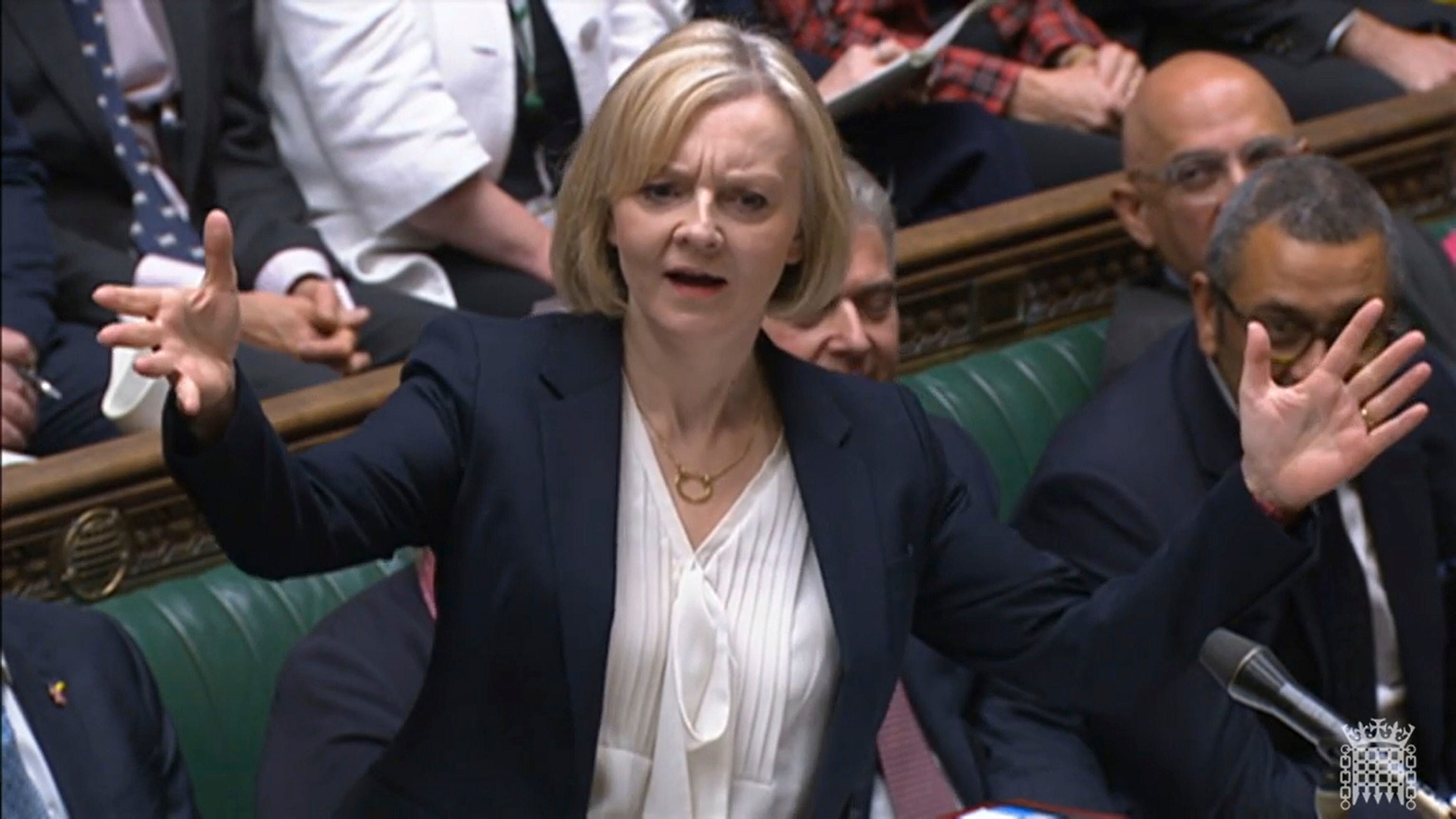 UK PM Truss vows to stay, but is on brink as minister quits