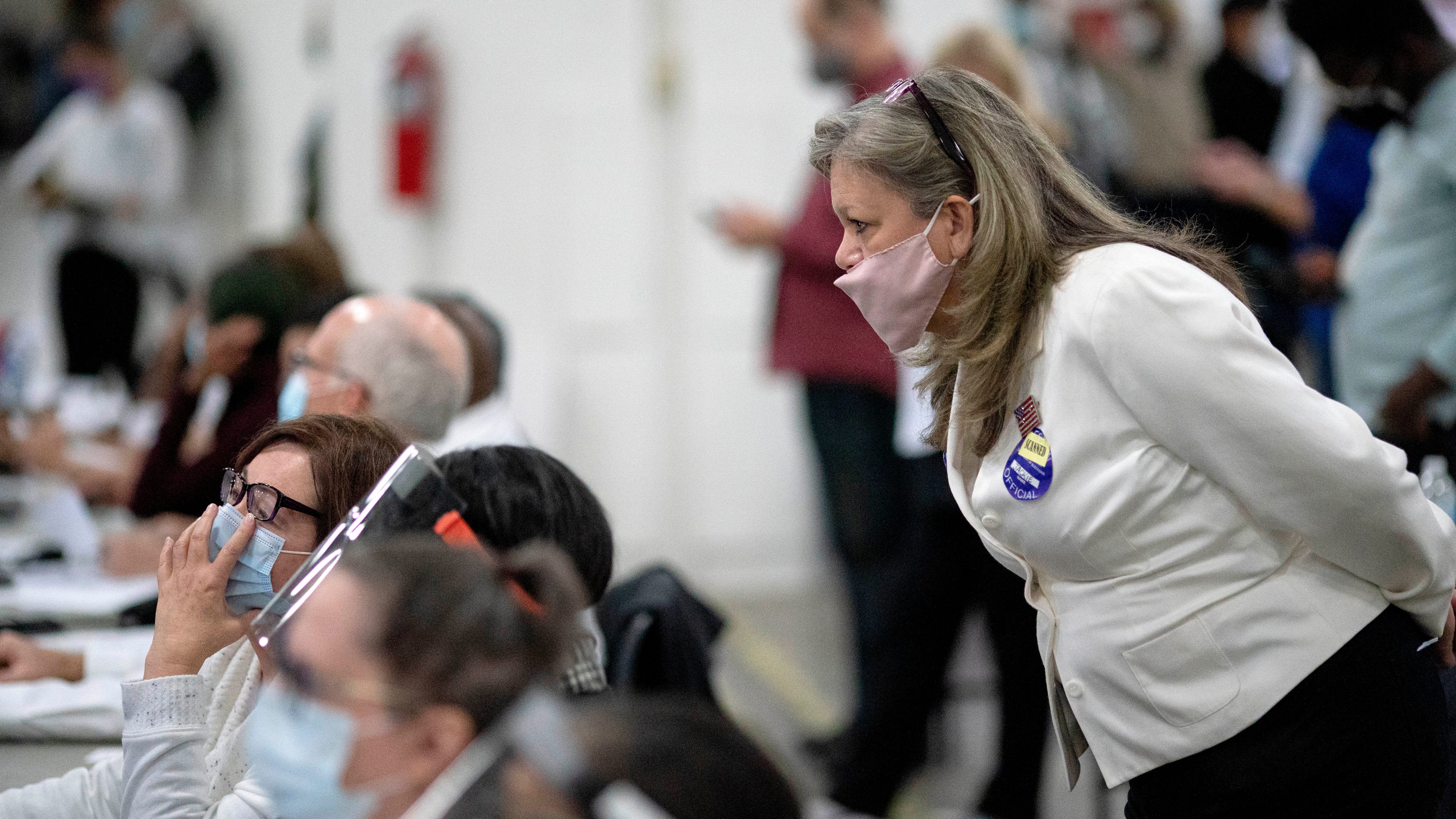 Election officials brace for confrontational poll watchers