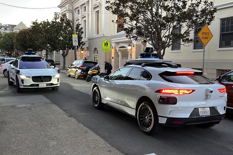 Uber Waymo Robotaxis
