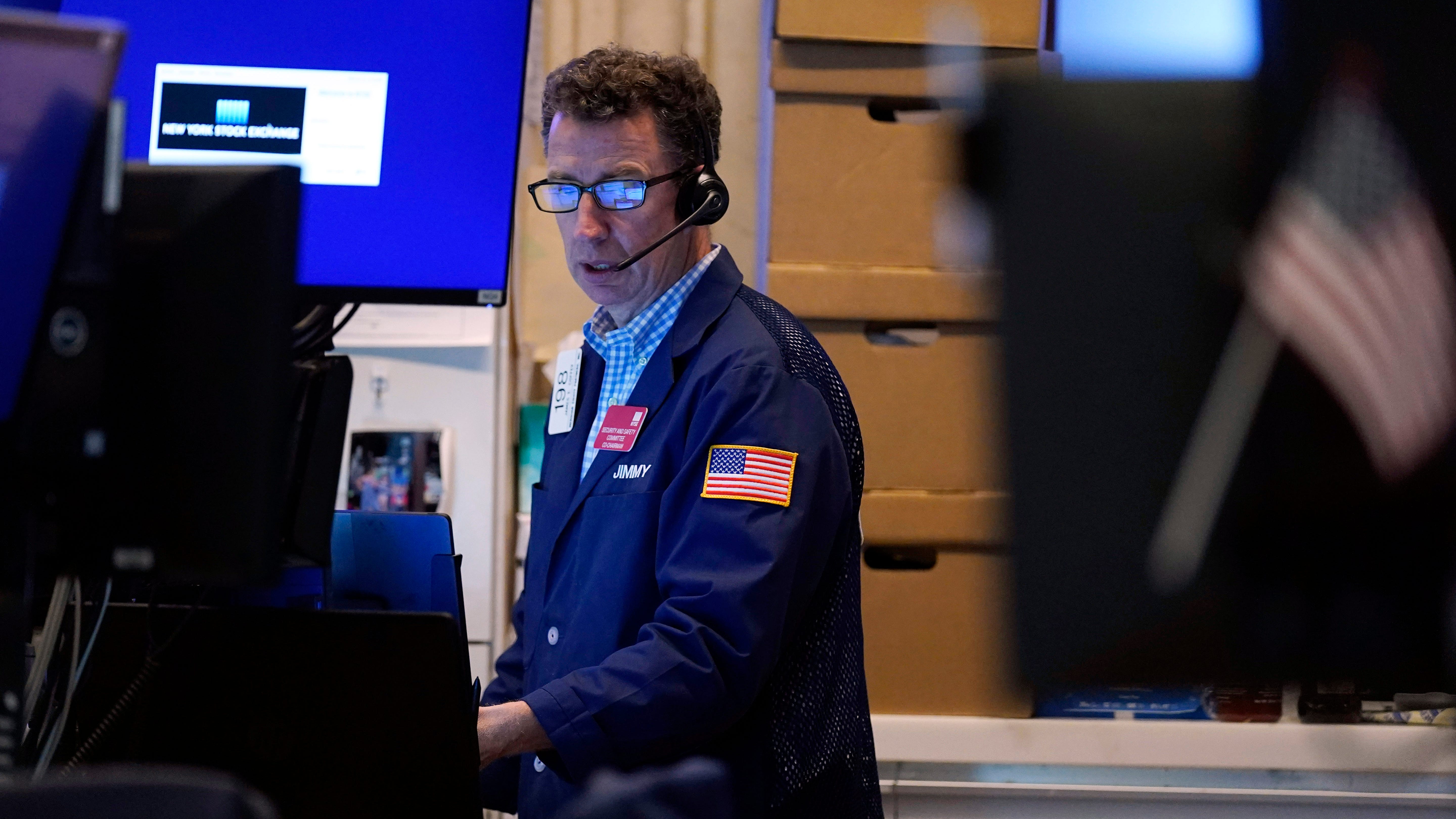 Stocks sink, yields tumble as virus fears circle the world