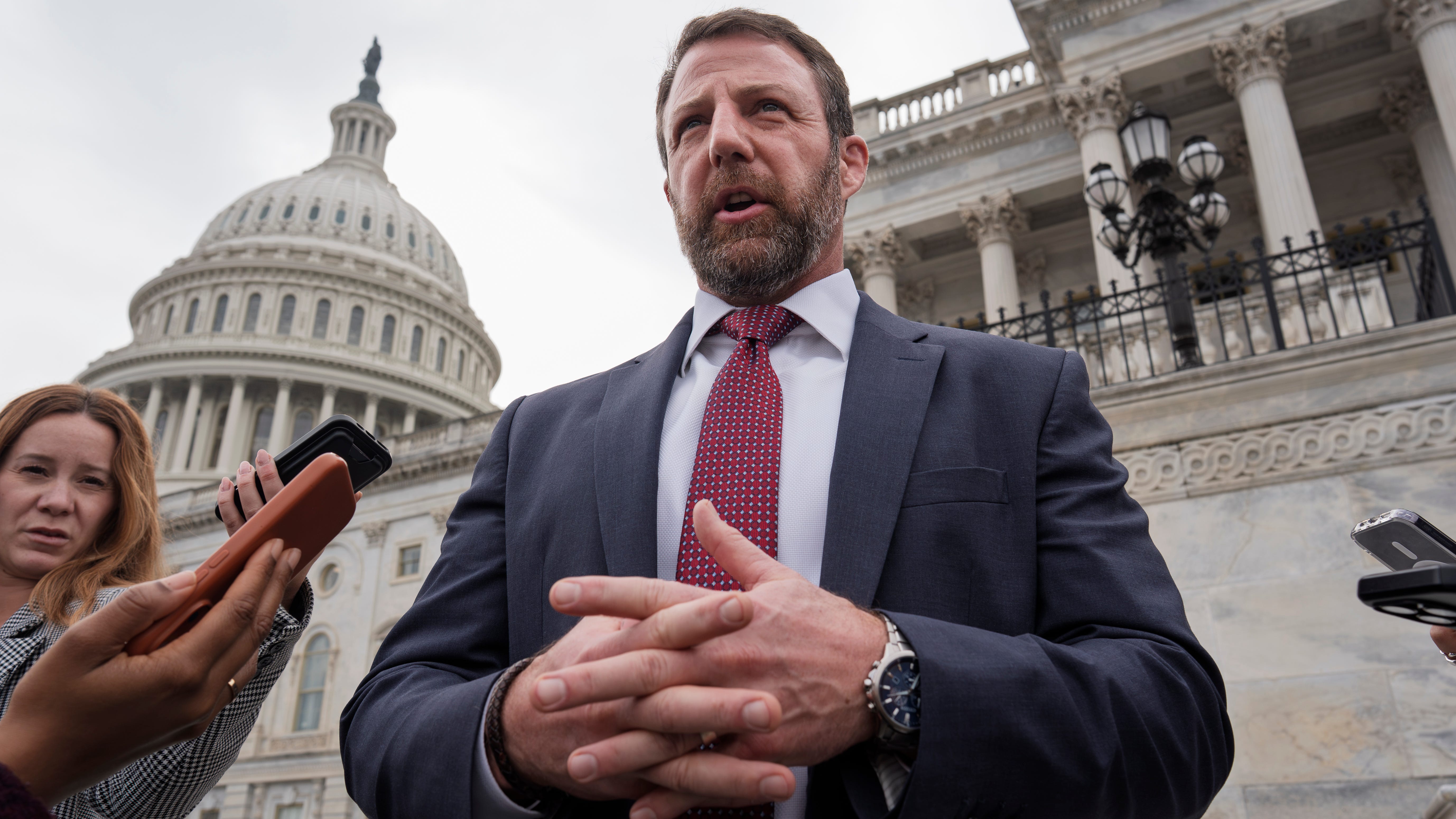 Trump turns to an Oklahoma senator with a fighter's reputation as his next choice to lead DHS