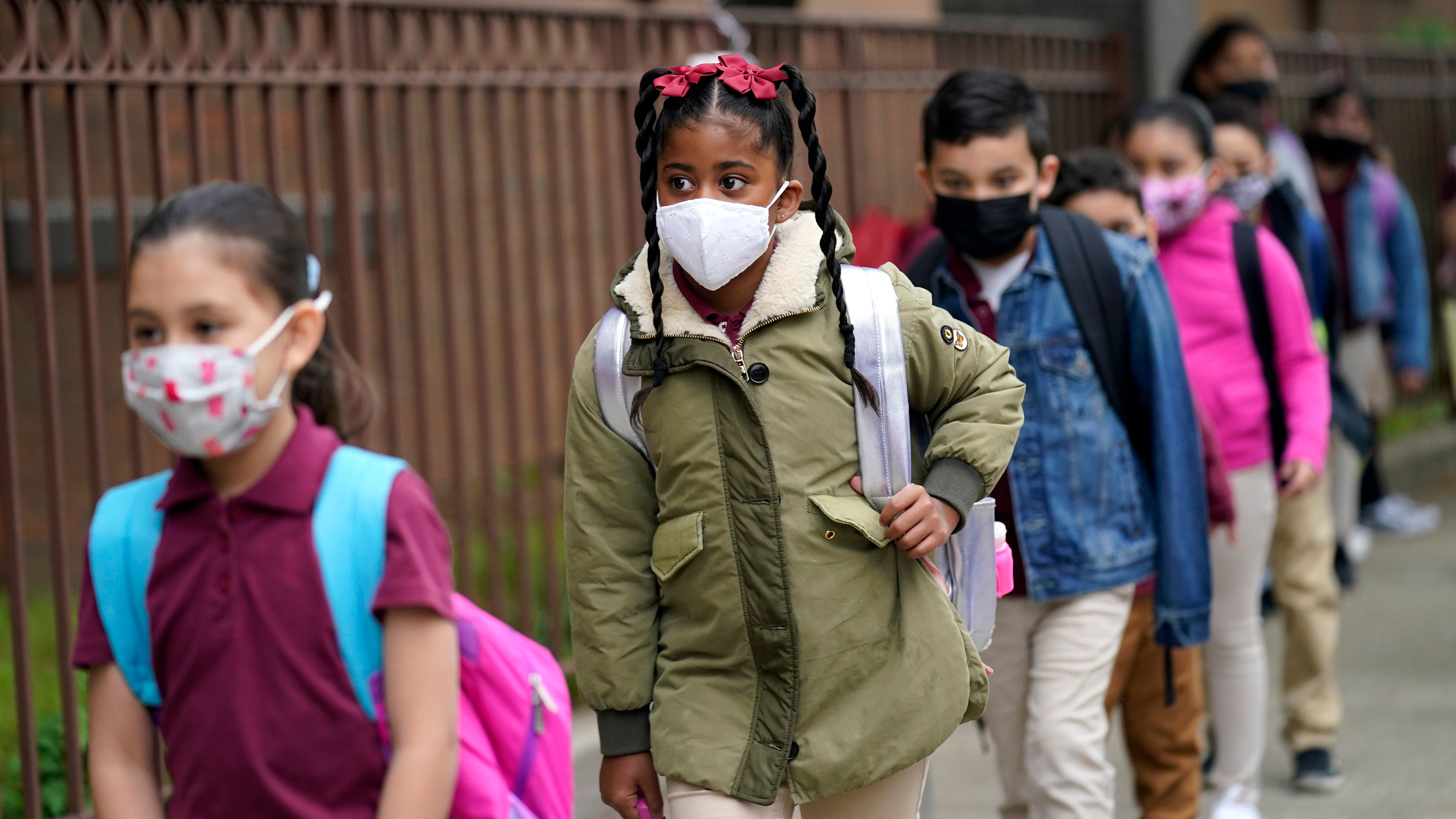 Governors in 4 states plan for end to school mask mandates