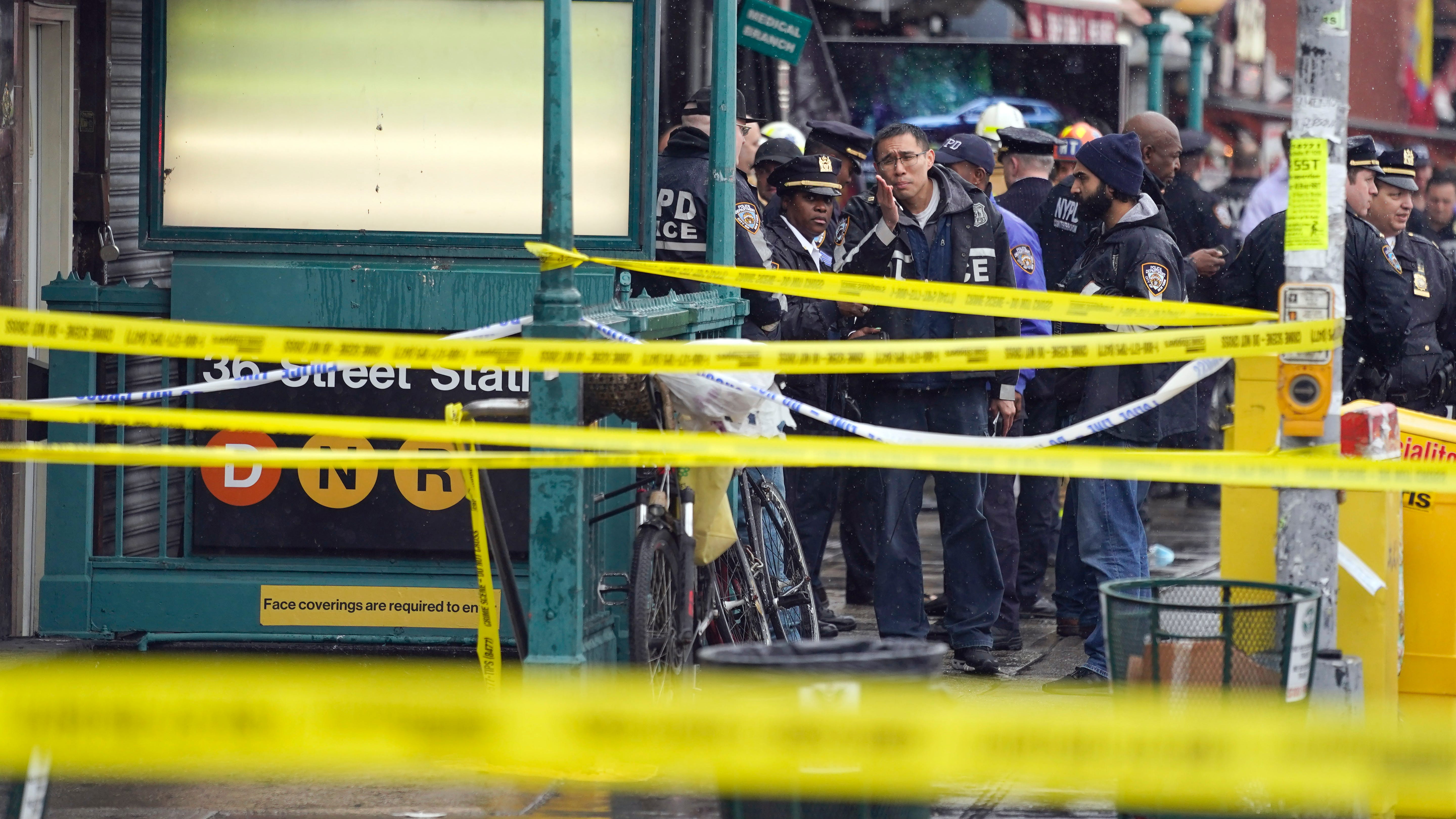 Police hunt gunman who wounded 10 in Brooklyn subway attack