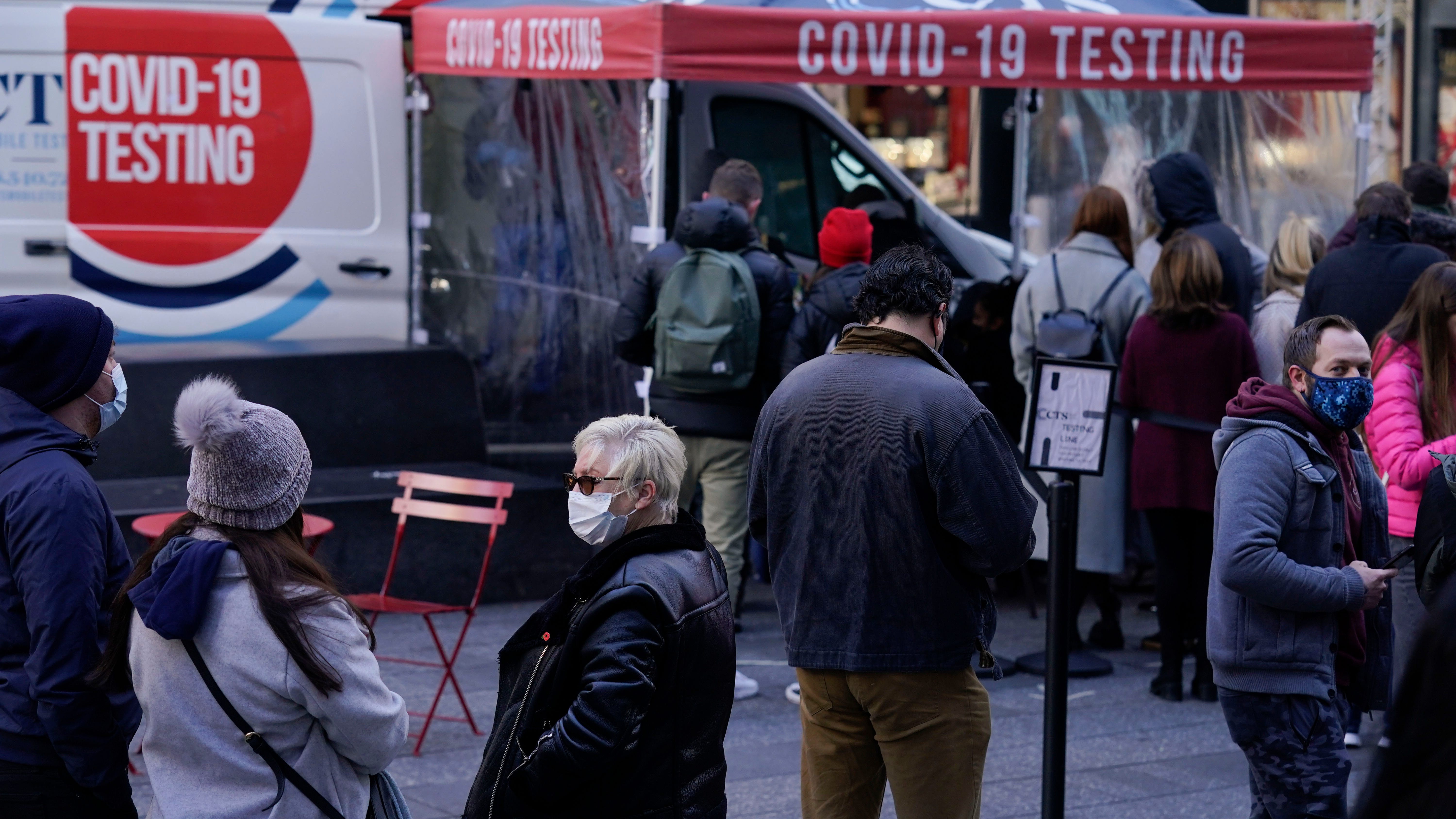 US faces a double coronavirus surge as omicron advances