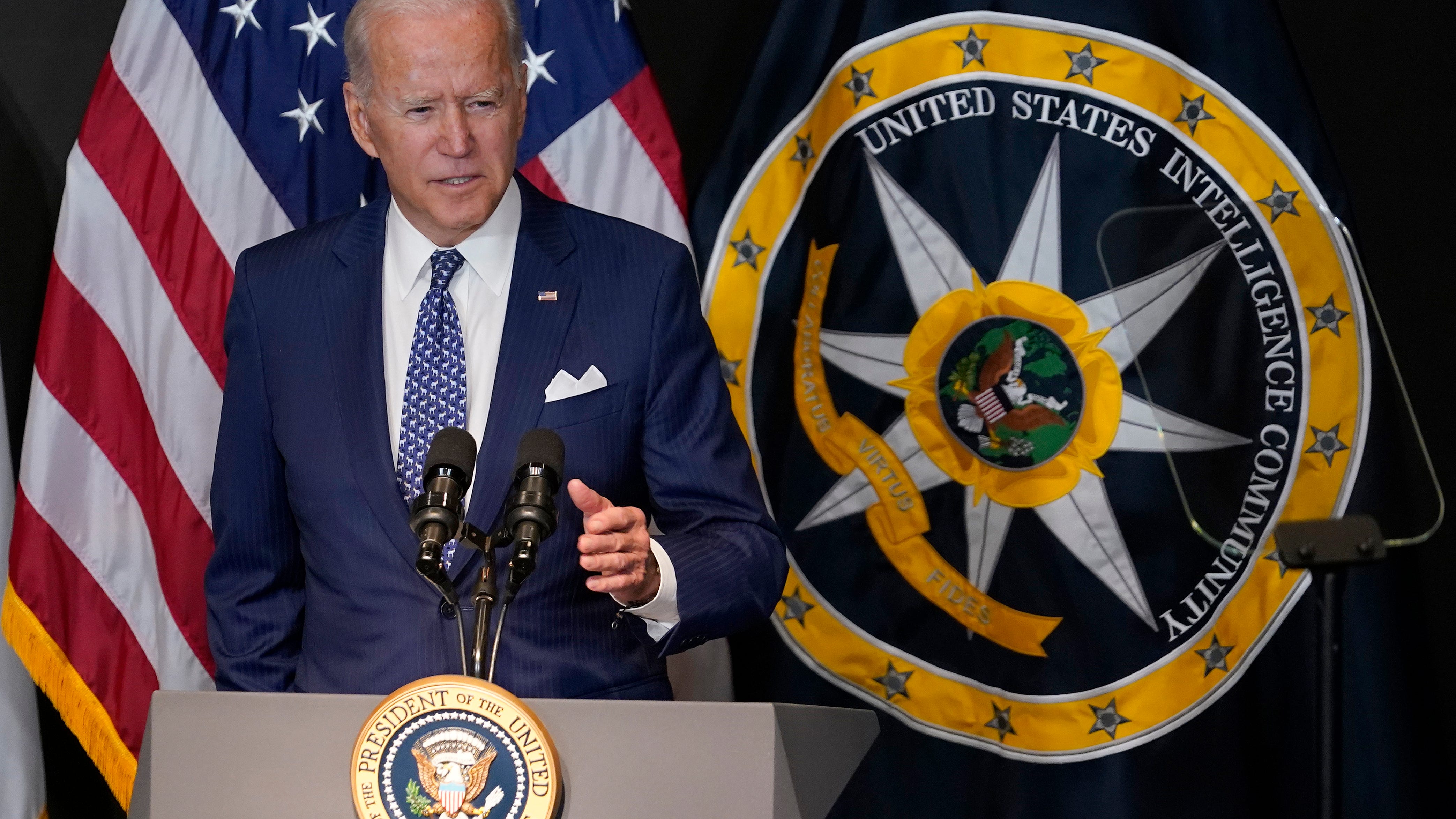 In 1st visit to intel agency, Biden warns of cyber conflict