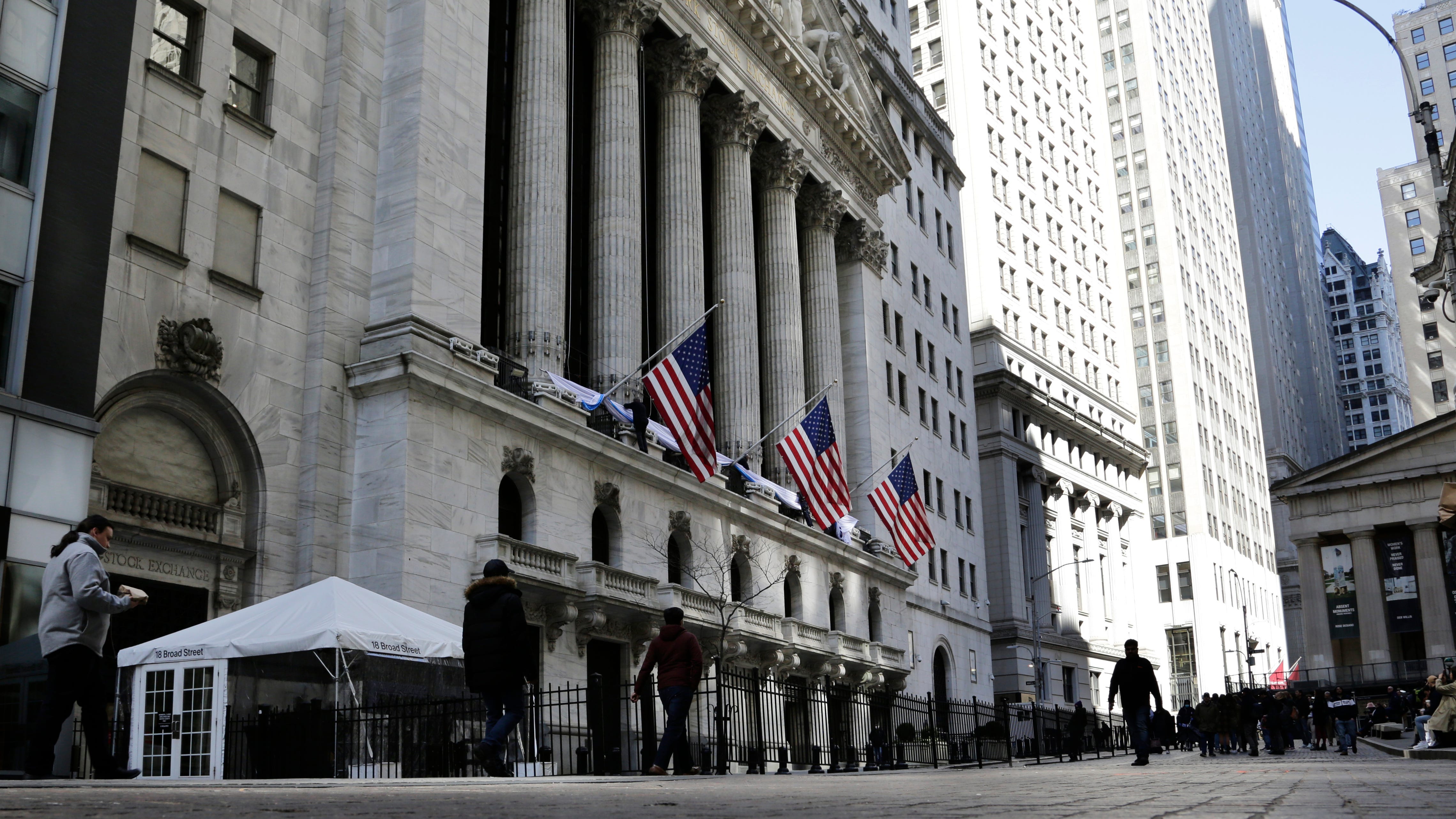 Stock market today: Wall Street slips ahead of a highly anticipated speech from the Federal Reserve