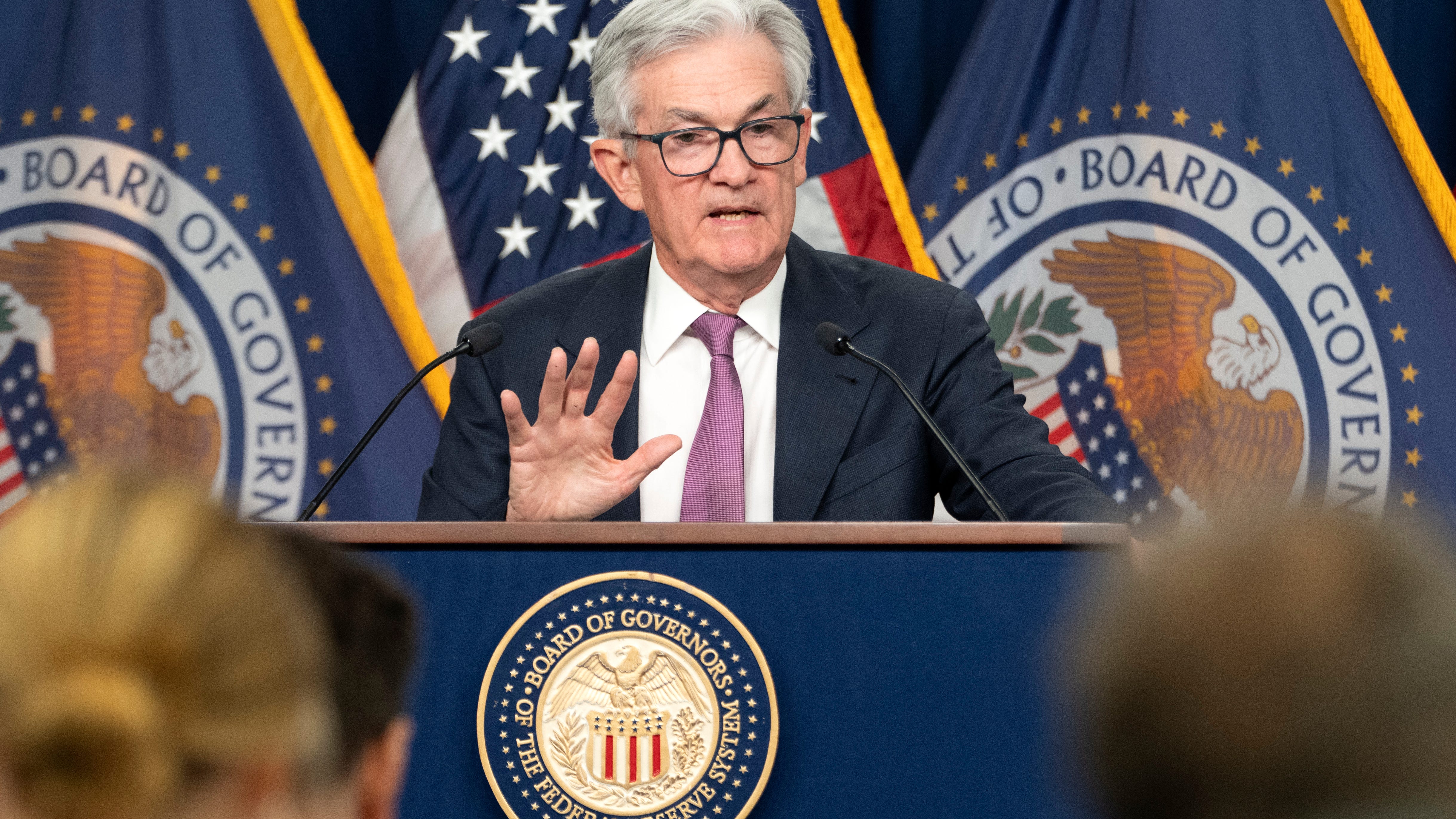 Fed lifts rate by quarter-point but says inflation is easing