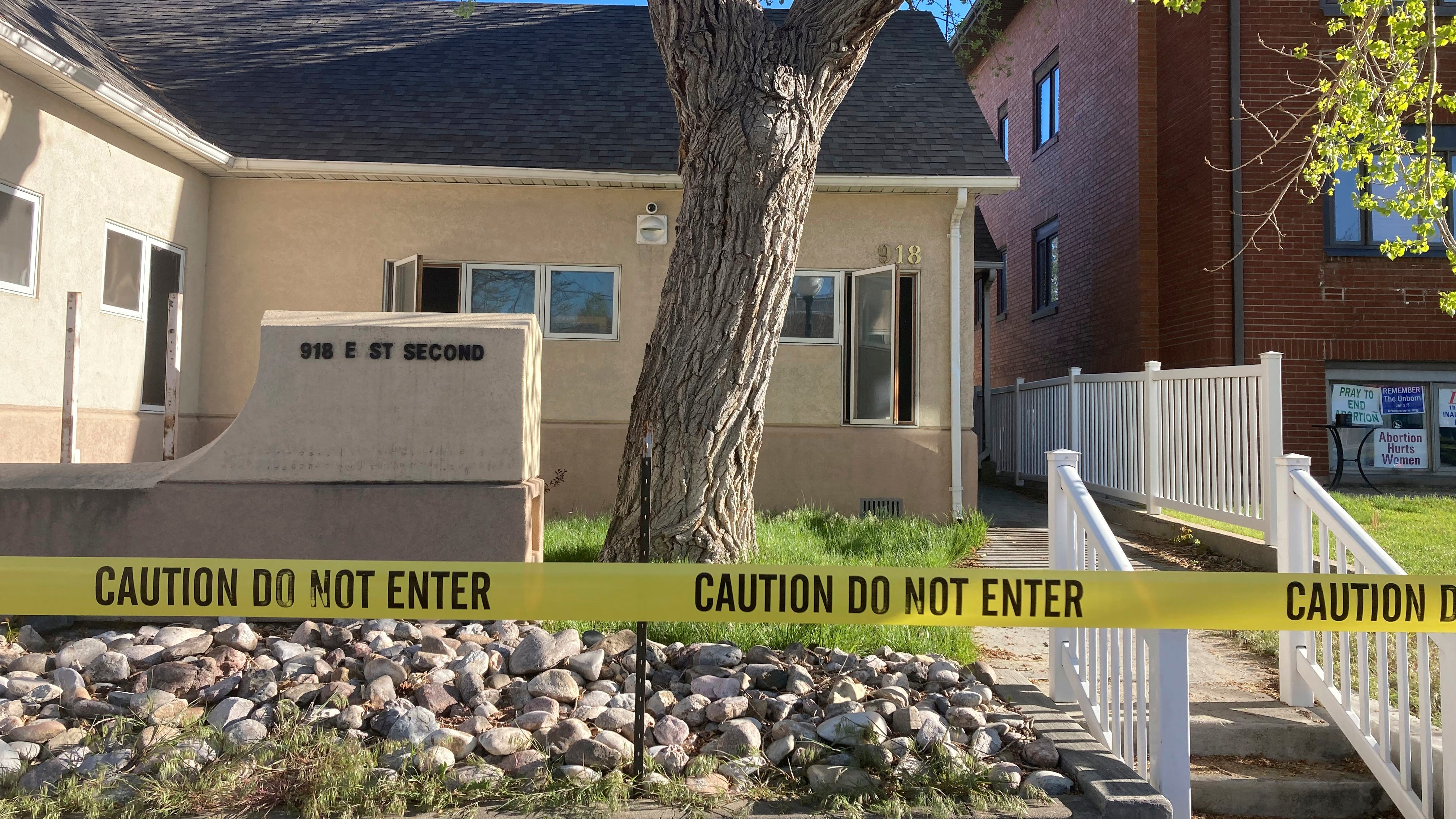 A woman pleads guilty to fire that kept a Wyoming abortion clinic from opening for a year