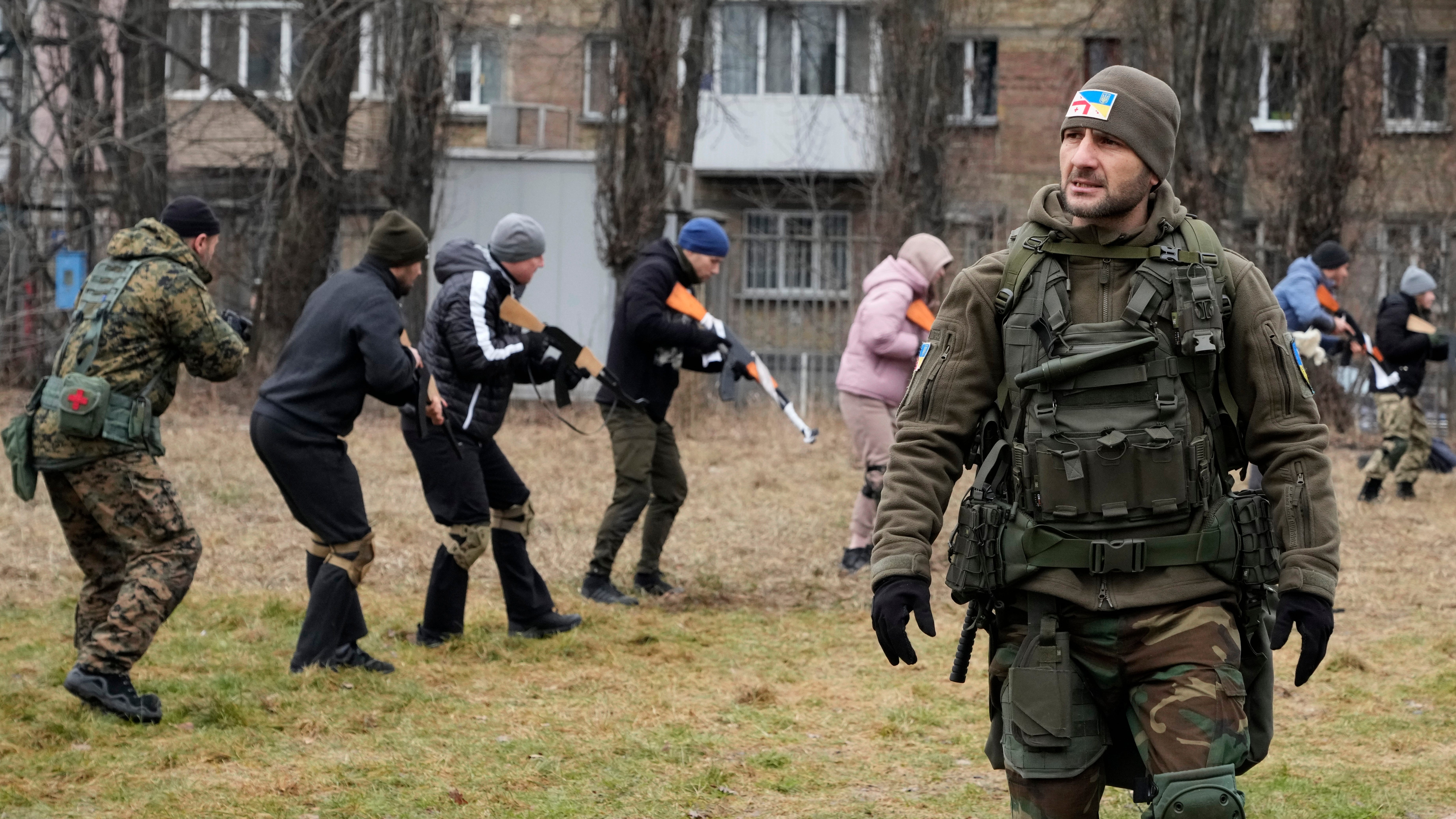 Ukraine officials come under shelling attack on front