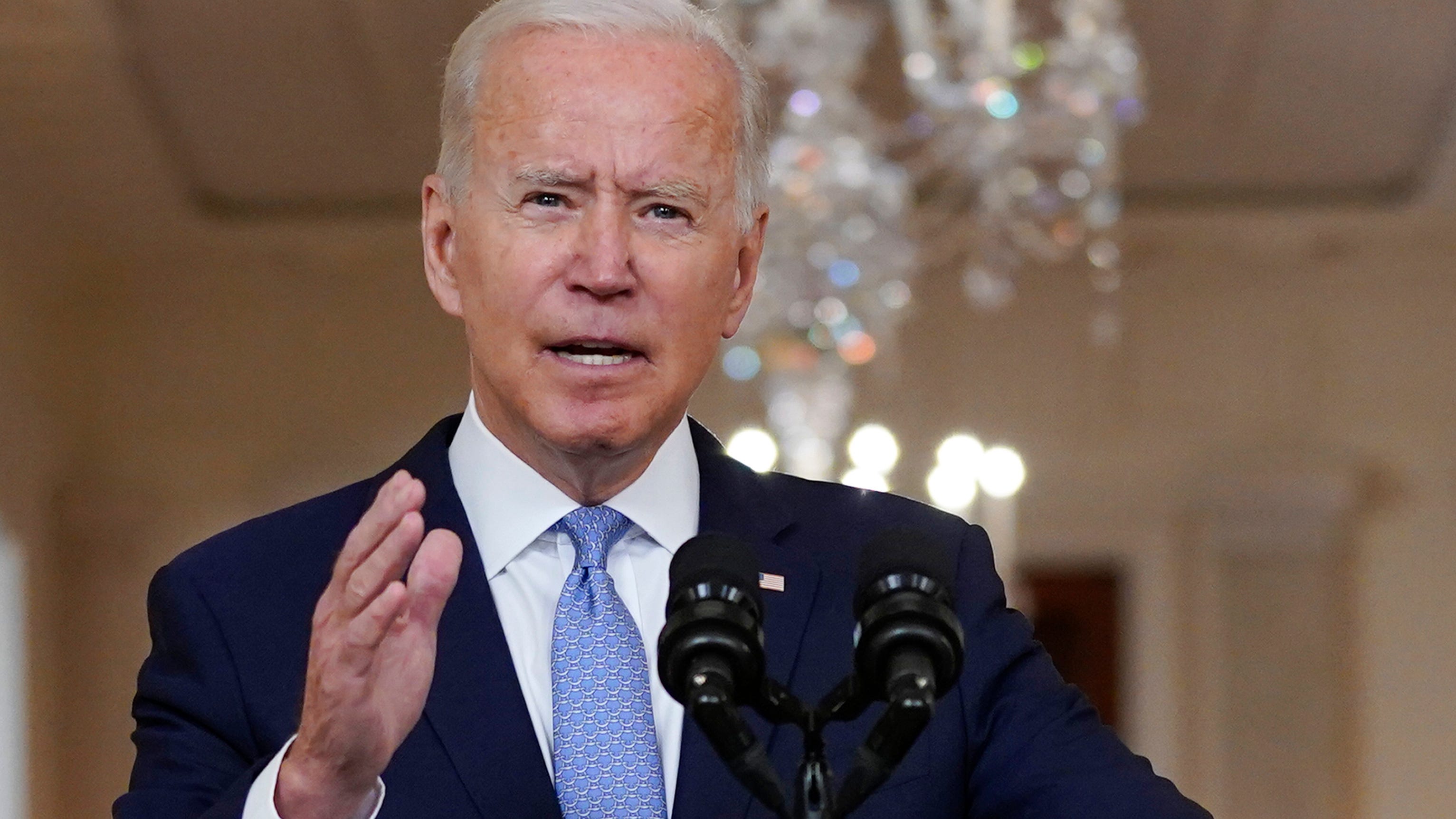 Biden defends departure from 'forever war,' praises airlift
