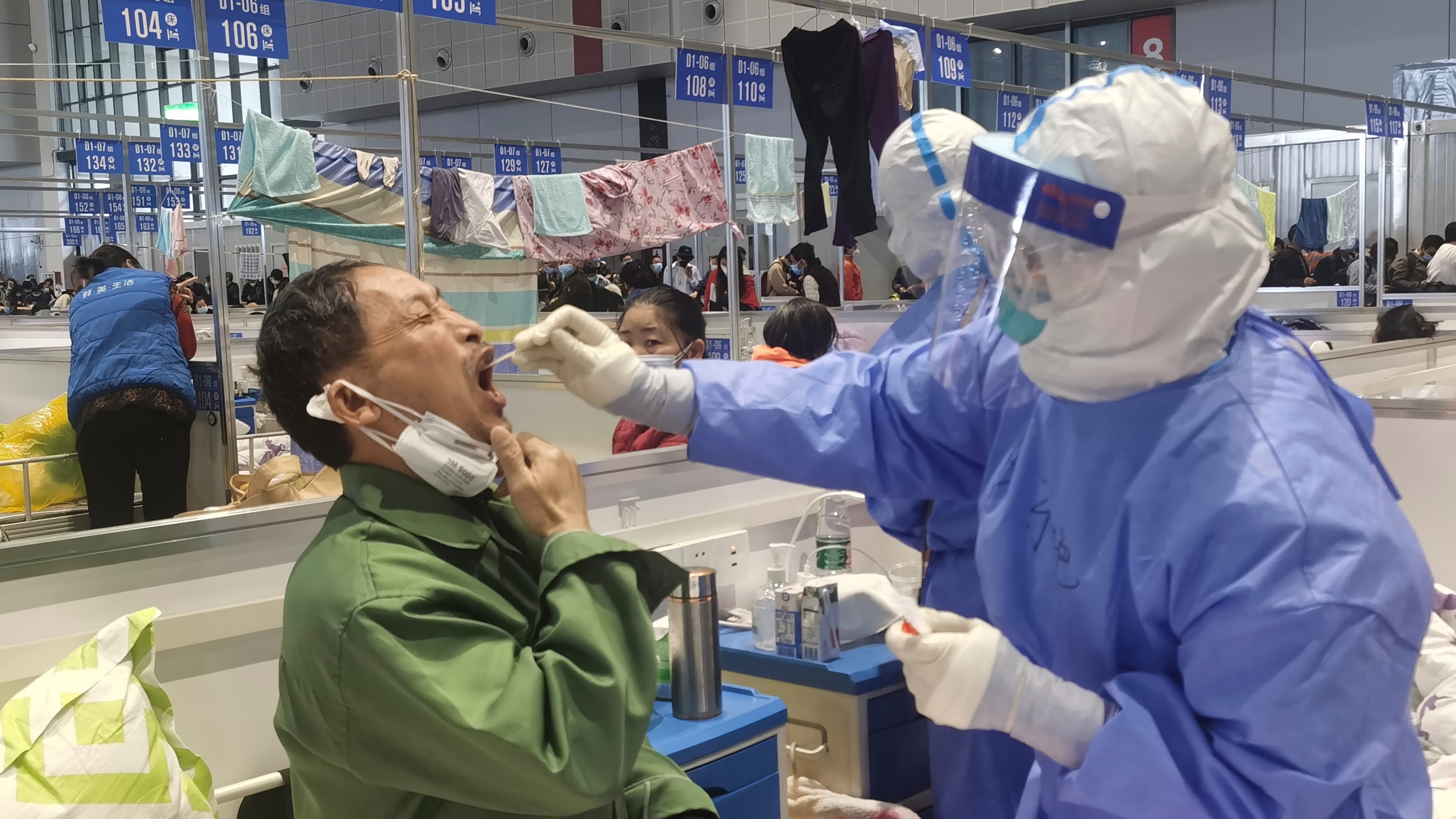 WHO says global COVID cases, deaths declined again last week