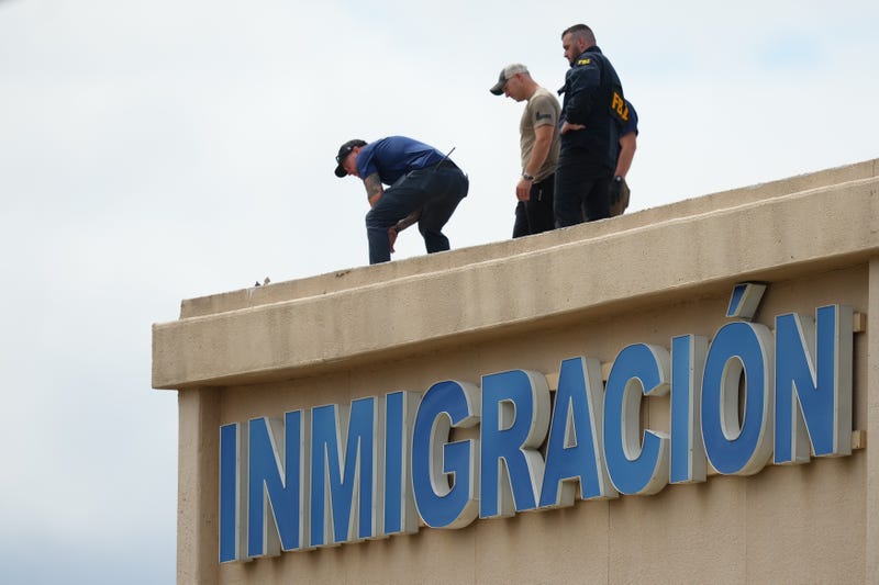 APTOPIX Immigration Facility Shooting