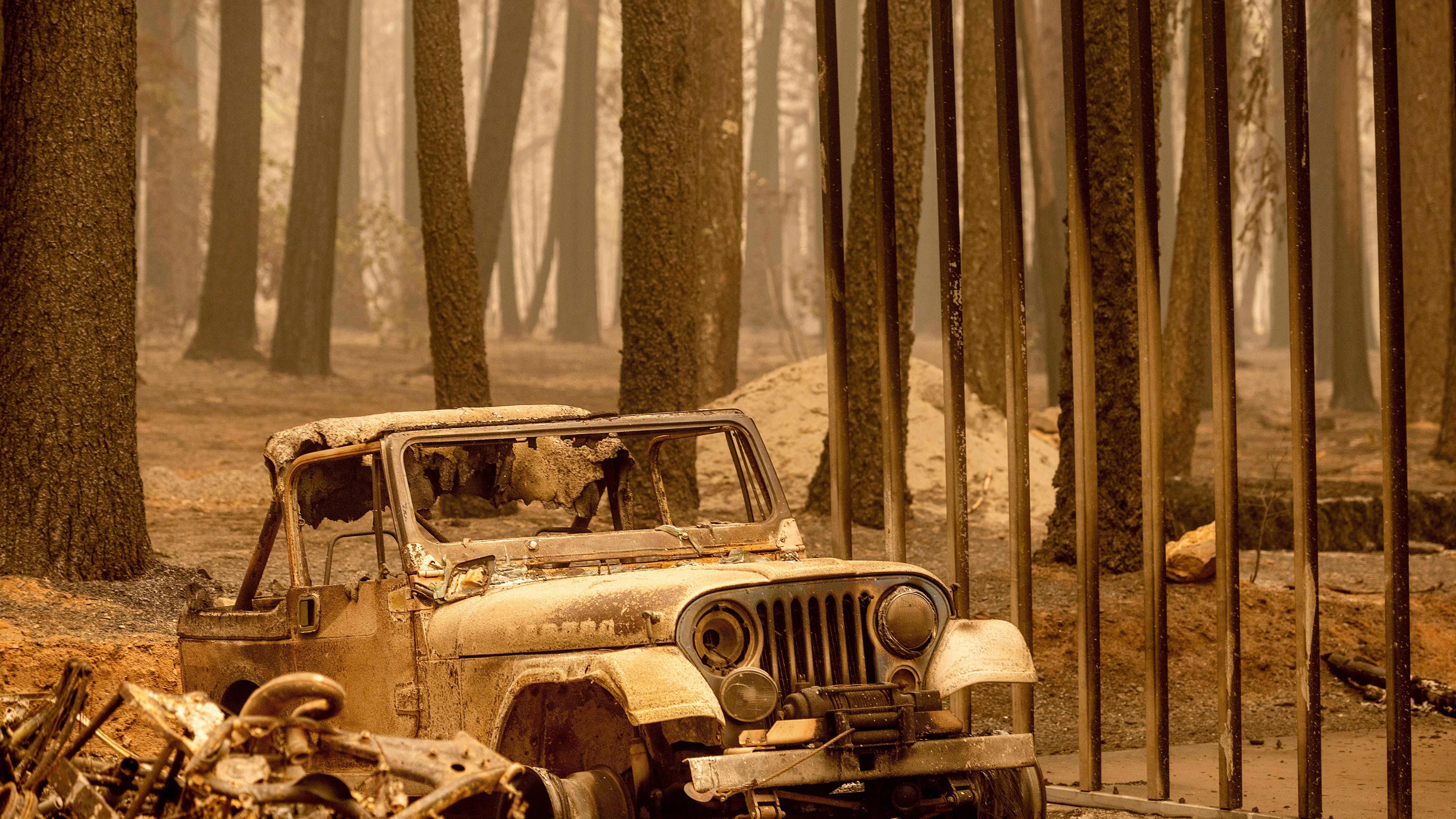Western wildfire battles aided by weather but losses grow