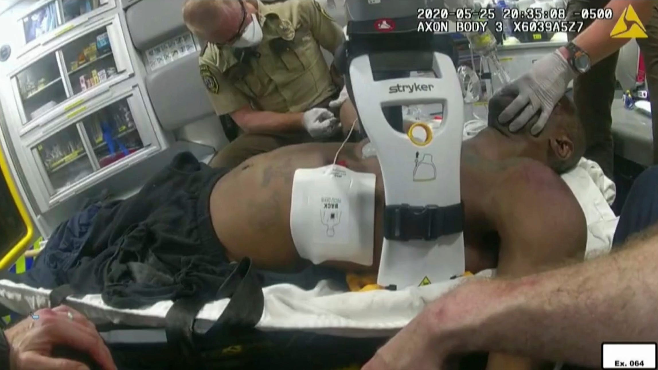 Firefighter says she urged officers to let her help Floyd