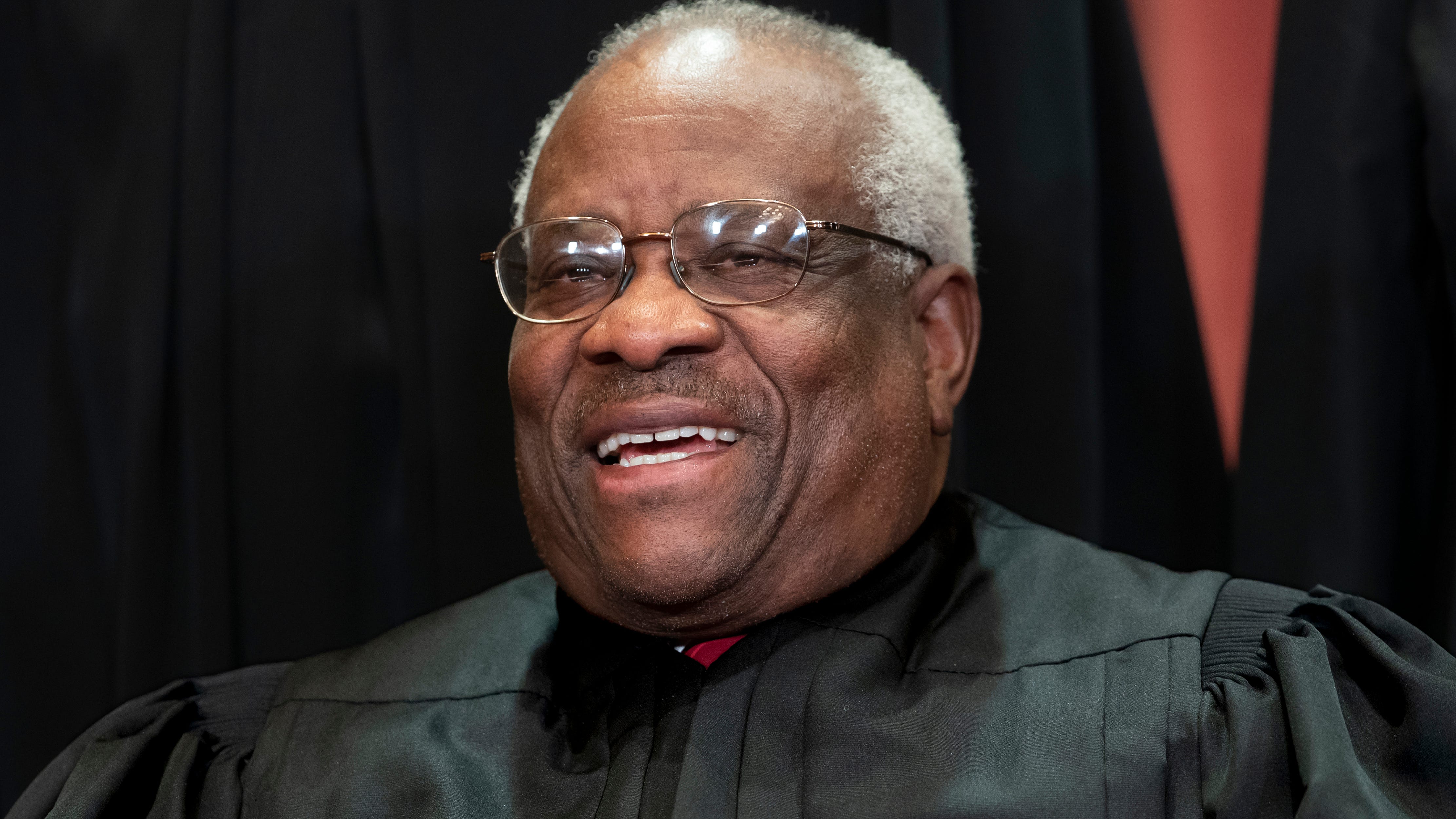 Justice Thomas joins arguments remotely after hospital stay