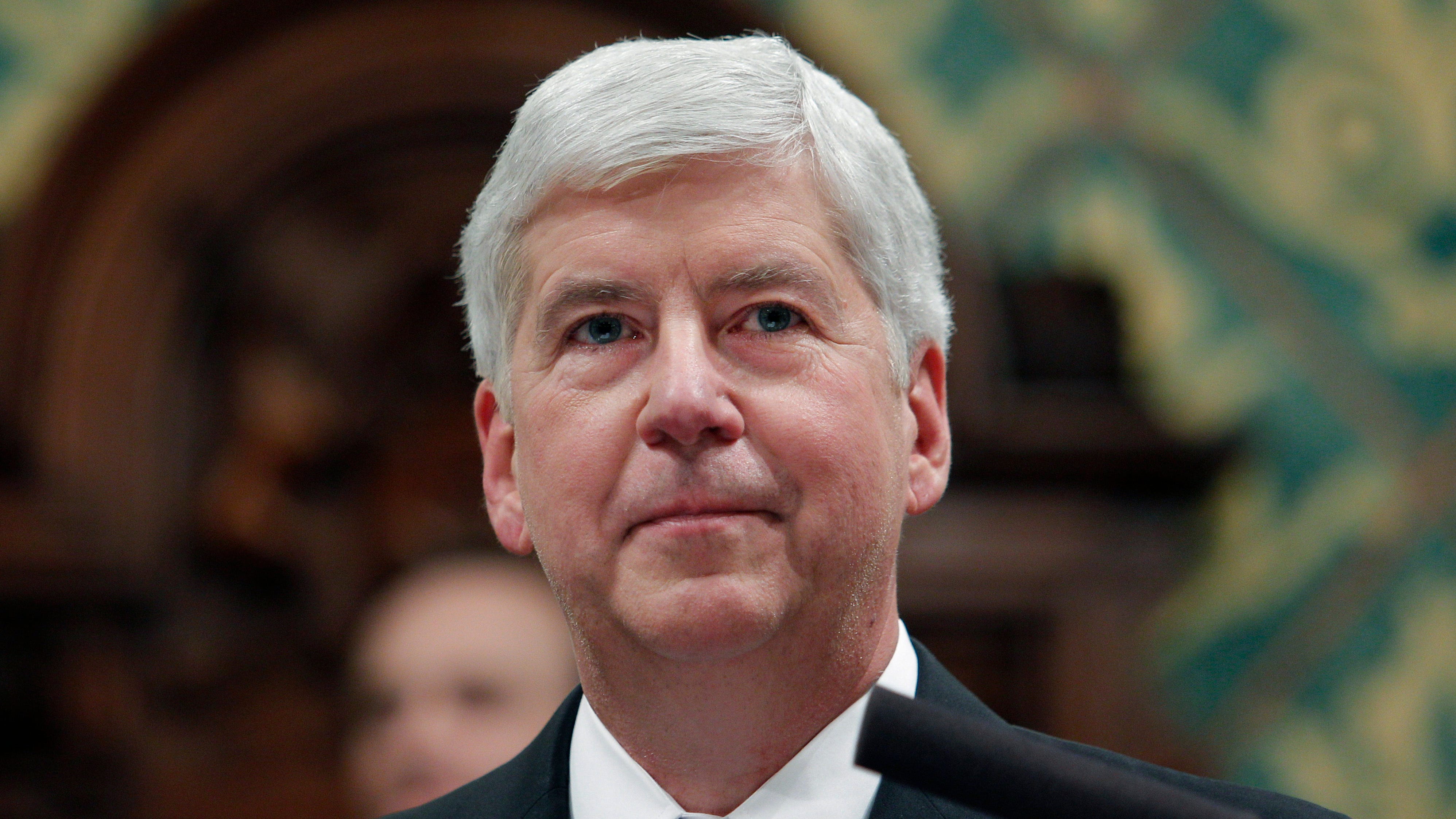 Ex-Michigan governor asks court to drop Flint water charges