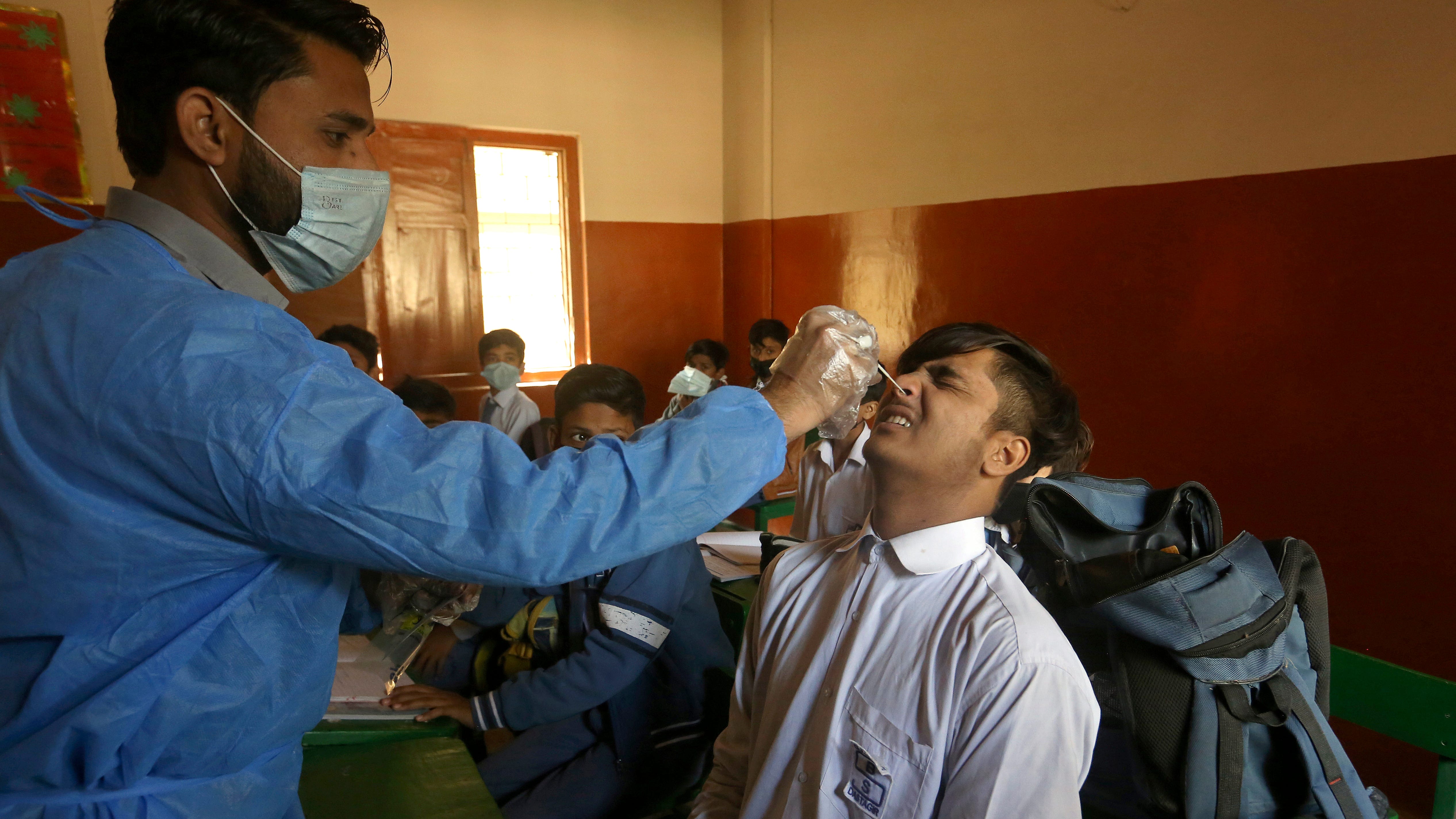 WHO counts 18 million virus cases last week as omicron slows