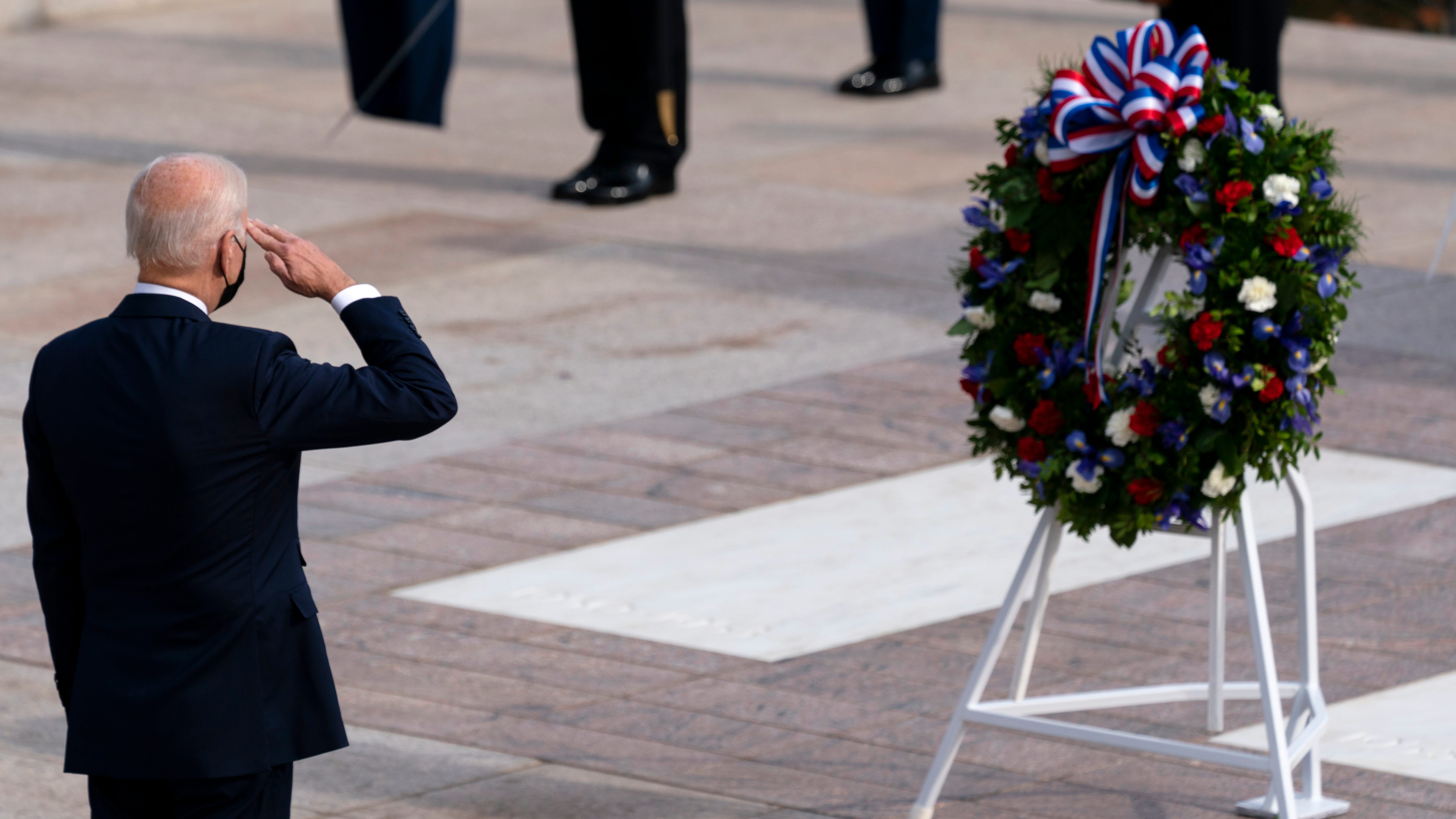 Biden salutes troops as 'spine of America' on Veterans Day