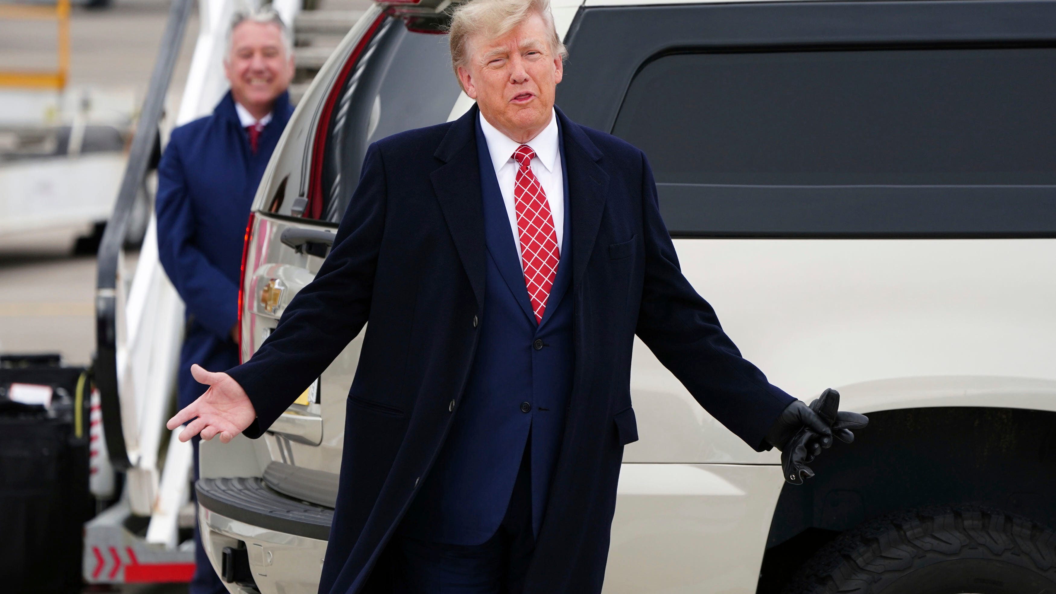 Trump travels to Scotland to open golf course amid NY trial