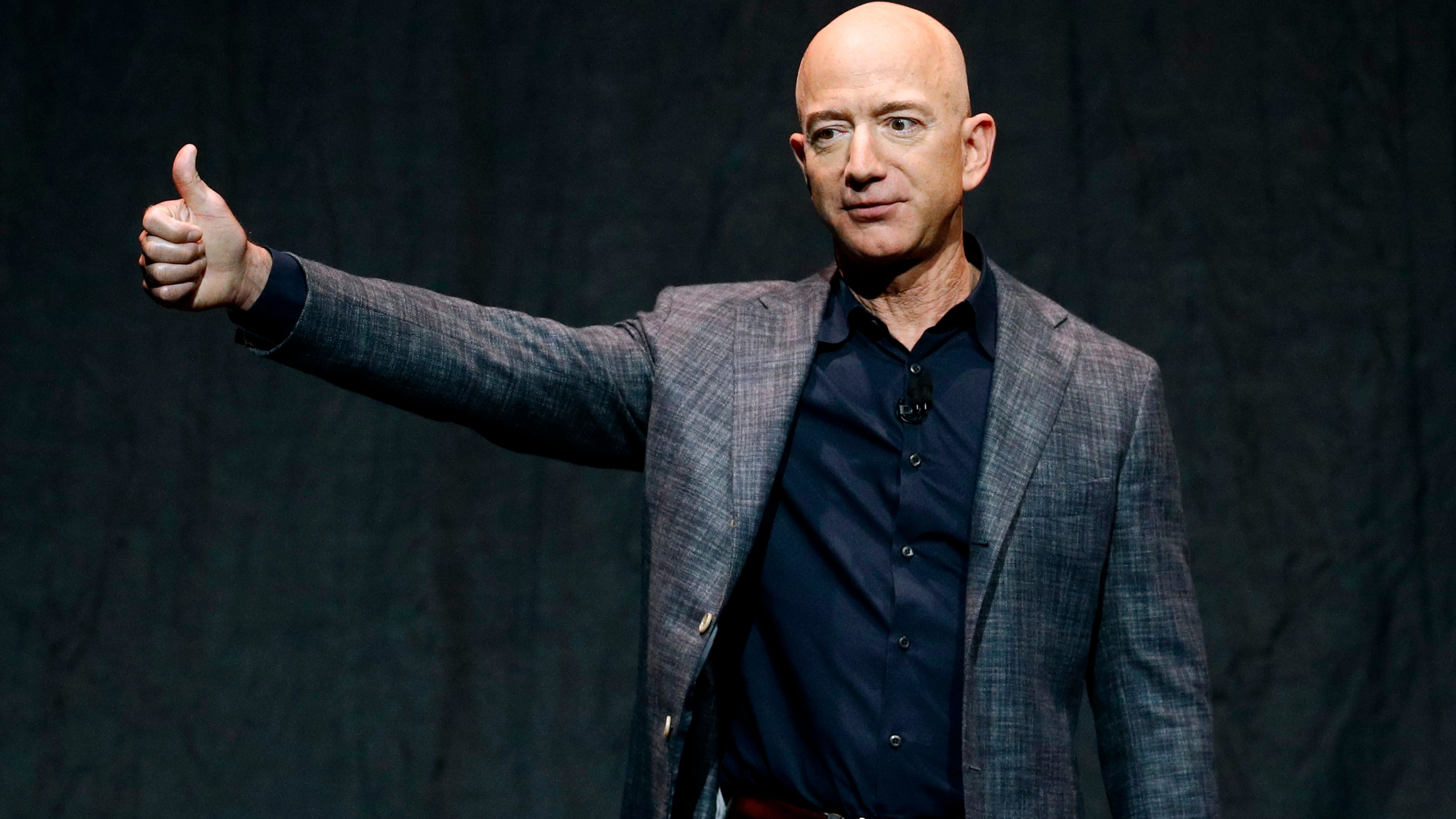 Bezos' Blue Origin gets OK to send him, 3 others to space