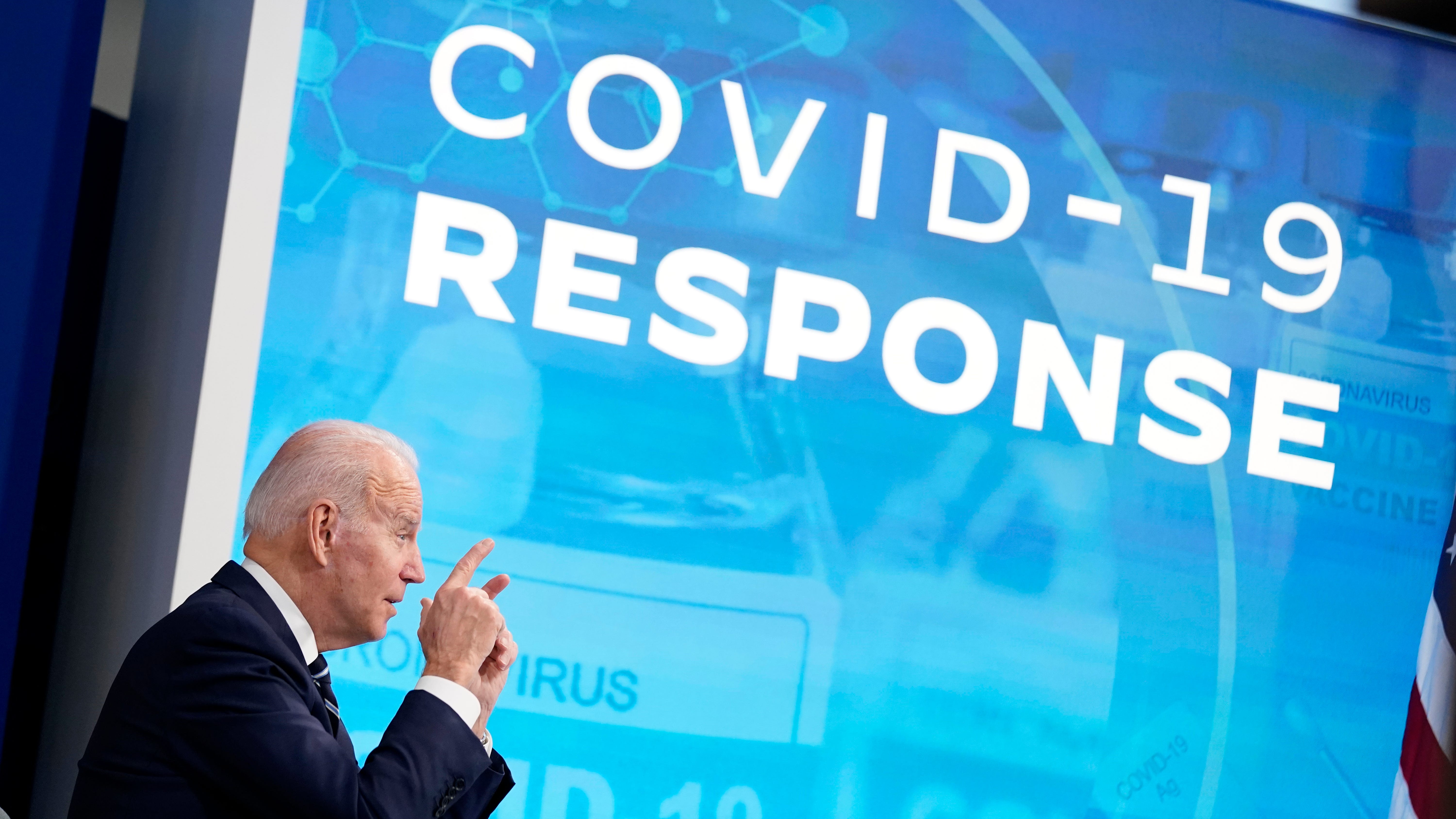 Biden to double free COVID tests, add masks to fight omicron