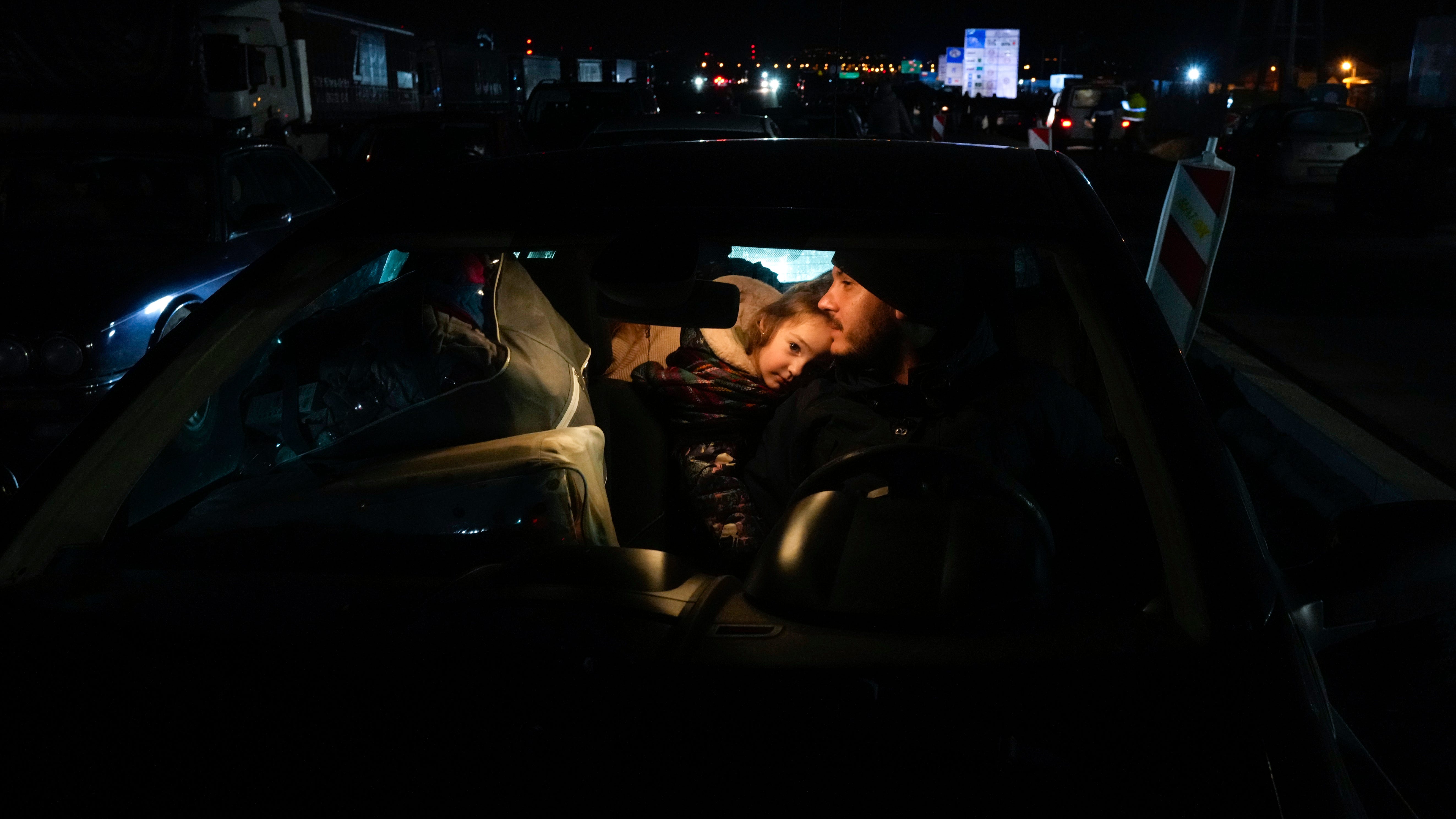 Ukrainians flee war, seeking safety across western borders