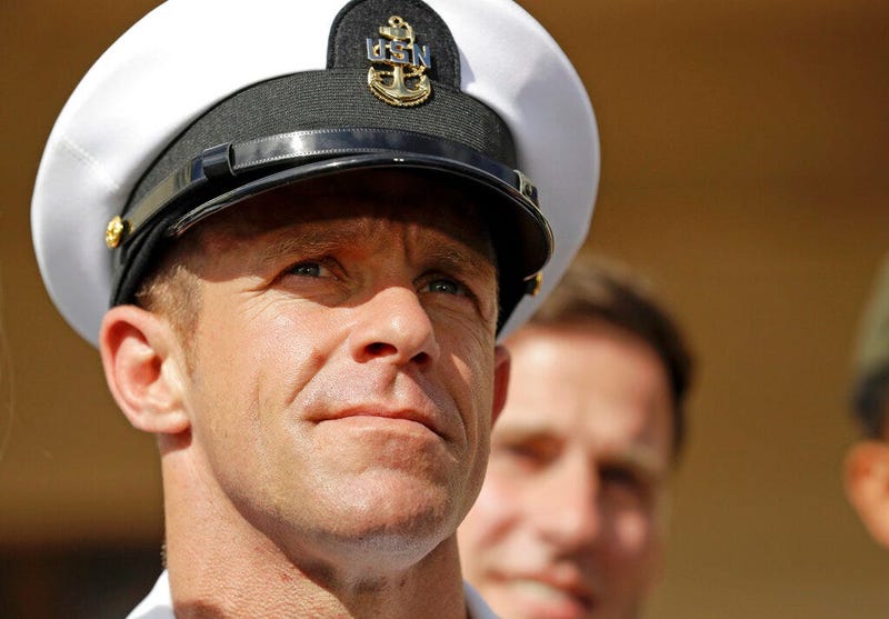 In this Tuesday, July 2, 2019, file photo, Navy Special Operations Chief Edward Gallagher leaves a military court on Naval Base San Diego.