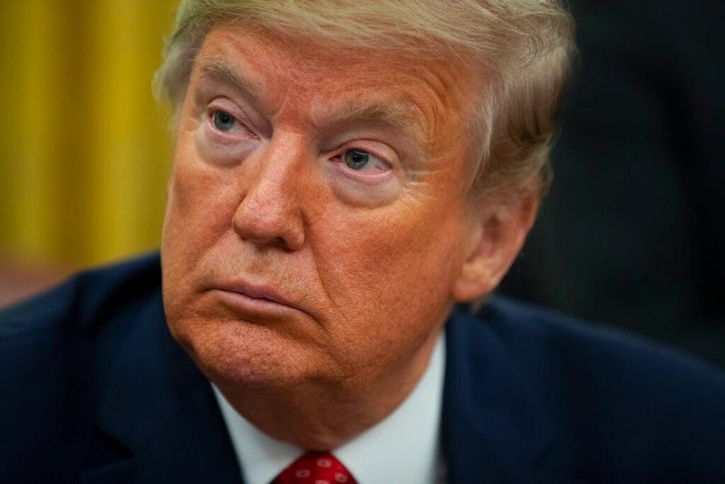 President Donald Trump listens during an event to sign an executive order establishing the Task Force on Missing and Murdered American Indians and Alaska Natives, in the Oval Office of the White House, Tuesday, Nov. 26, 2019, in Washington.