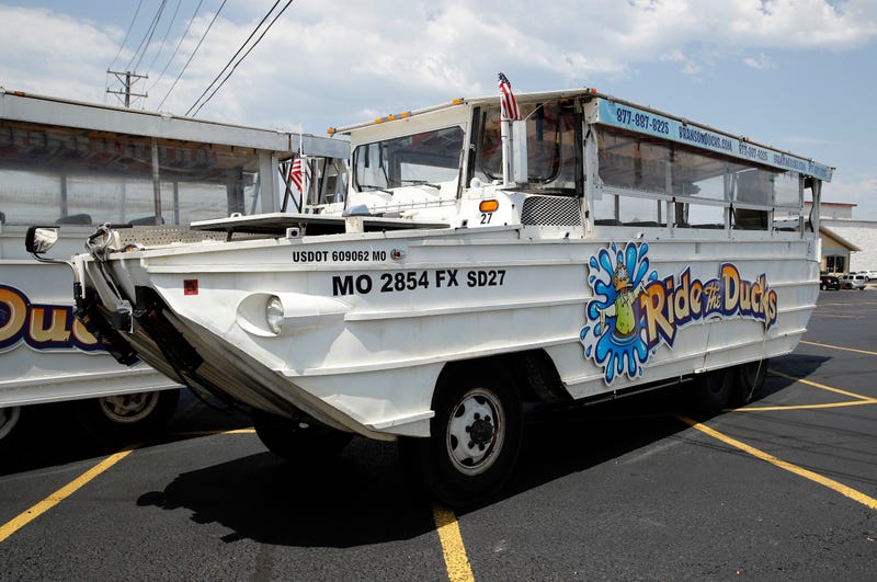 A duck boat sits idle in the parking lot of Ride the Ducks, an amphibious tour operator in Branson, Mo. Friday, July 20, 2018.