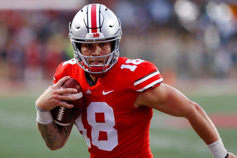 FILE - In this Sept. 22, 2018, file photo, Ohio State quarterback Tate Martell runs against Tulane during an NCAA college football game in Columbus, Ohio. Martell says he is transferring from Ohio State to Miami. Martell announced on Twitter early Wednesd