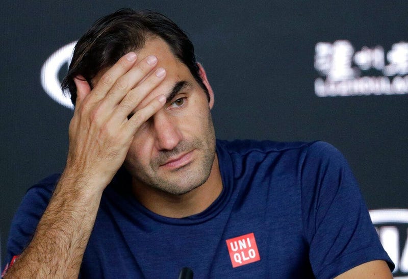 Switzerland's Roger Federer answers questions at a press conference following his fourth round loss to Greece's Stefanos Tsitsipas at the Australian Open tennis championships in Melbourne, Australia, Sunday, Jan. 20, 2019