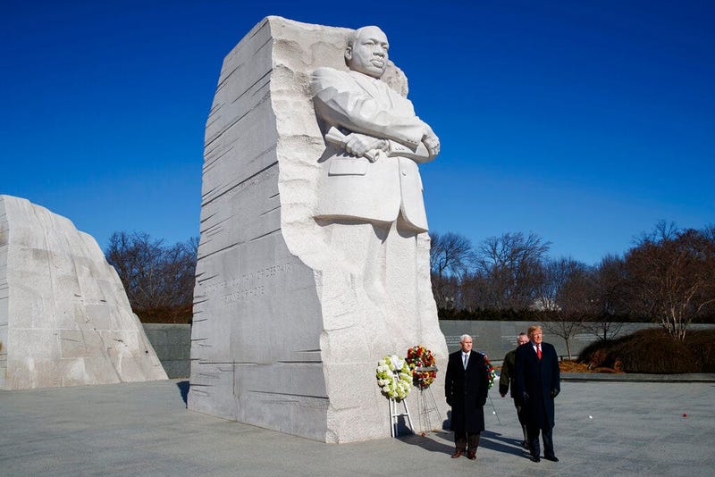 President Donald Trump, right, and Vice President Mike Pence, left, visit the Martin Luther King Jr. Memorial, Monday, Jan. 21, 2019, in Washington