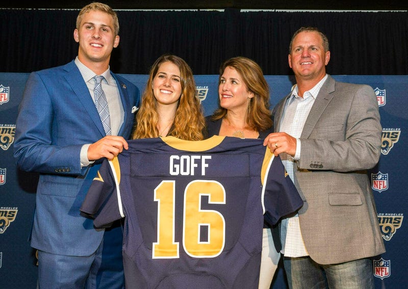 California's Jared Goff posing for photos with his family after being selected by the Los Angeles Rams as the first pick in the first round of the NFL football draft
