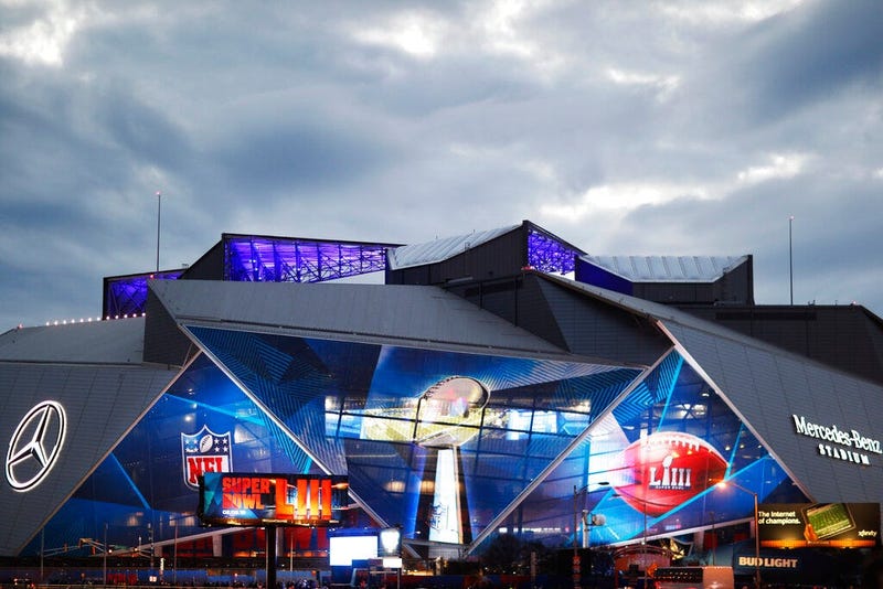 Mercedes-Benz Stadium is lit up ahead of Sunday's NFL Super Bowl 53 football game between the Los Angeles Rams and New England Patriots in Atlanta, Saturday, Feb. 2, 2019