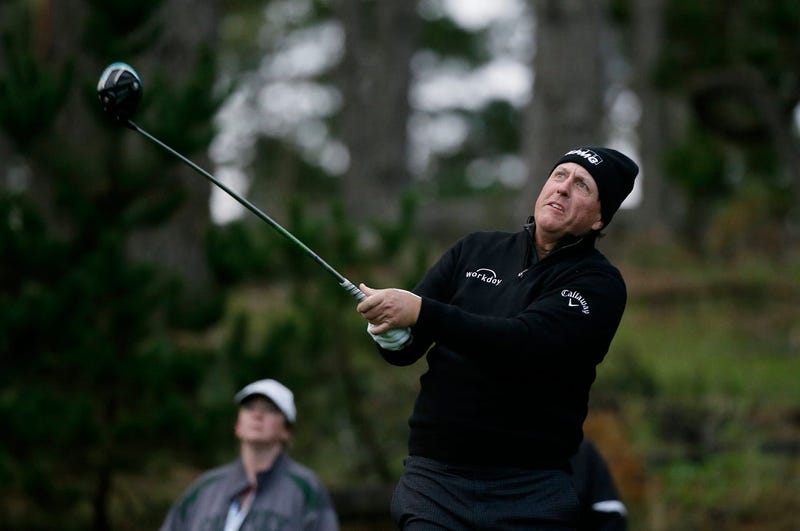 Phil Mickelson follows his drive from the 11th tee of the Spyglass Hill Golf Course during the second round of the AT&T Pebble Beach National Pro-Am golf tournament Friday, Feb. 8, 2019, in Pebble Beach, Calif. (AP Photo/Eric Risberg)