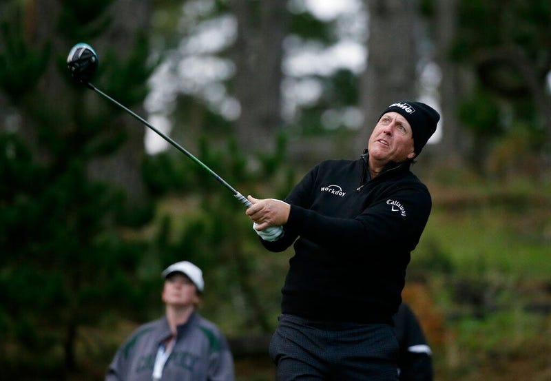 Phil Mickelson follows his drive from the 11th tee of the Spyglass Hill Golf Course during the second round of the AT&T Pebble Beach National Pro-Am golf tournament Friday, Feb. 8, 2019