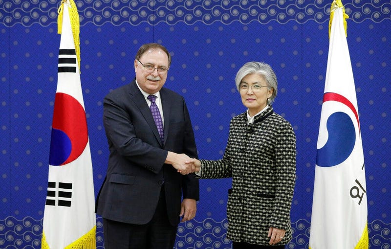 South Korean Foreign Minister Kang Kyung-wha, right, and Timothy Betts, acting Deputy Assistant Secretary and Senior Advisor for Security Negotiations and Agreements in the U.S. Department of State, shake hands for the media before their meeting at Foreig