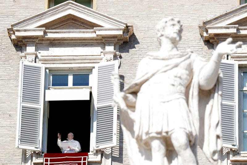 Pope Francis delivers his blessing during the Angelus noon prayer In St. Peter's Square at the Vatican, Sunday, Feb. 17, 2019. The pontiff is asking for prayers for this week's sex abuse summit at the Vatican, calling abuse an "urgent challenge of our tim