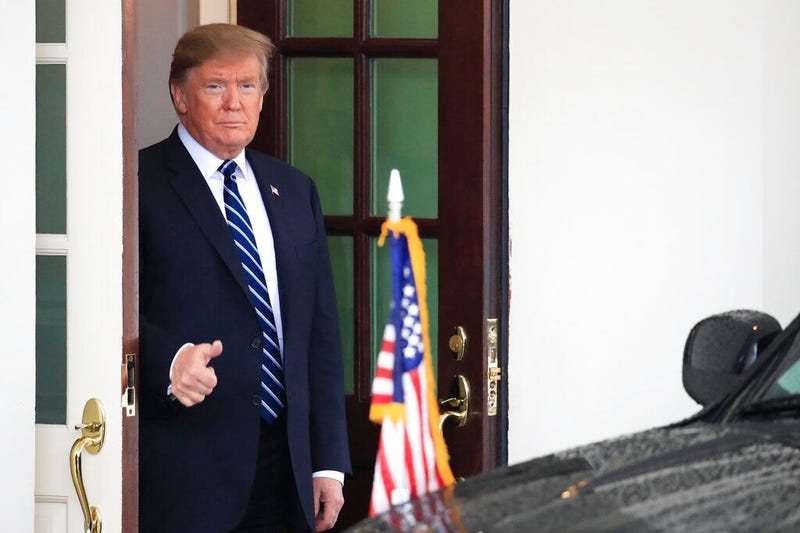 President Donald Trump gestures as visiting Austrian Chancellor Sebastian Kurz leaves the White House in Washington following their meeting, Wednesday, Feb. 20, 2019