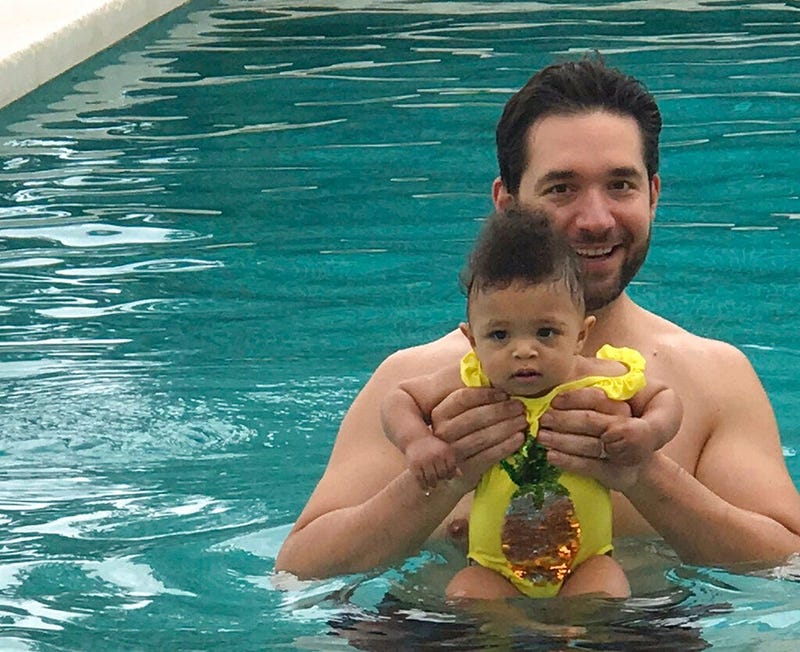 Edelman communications marketing firm, Alexis Ohanian, founder of the social media company Reddit, poses for a photo with his daughter Olympia.