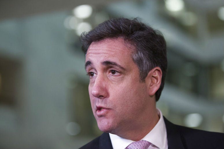 Michael Cohen, President Donald Trump's former lawyer, speaks with the media as he departs after testifying before a closed door hearing of the Senate Intelligence Committee on Capitol Hill, Tuesday, Feb. 26, 2019, in Washington.