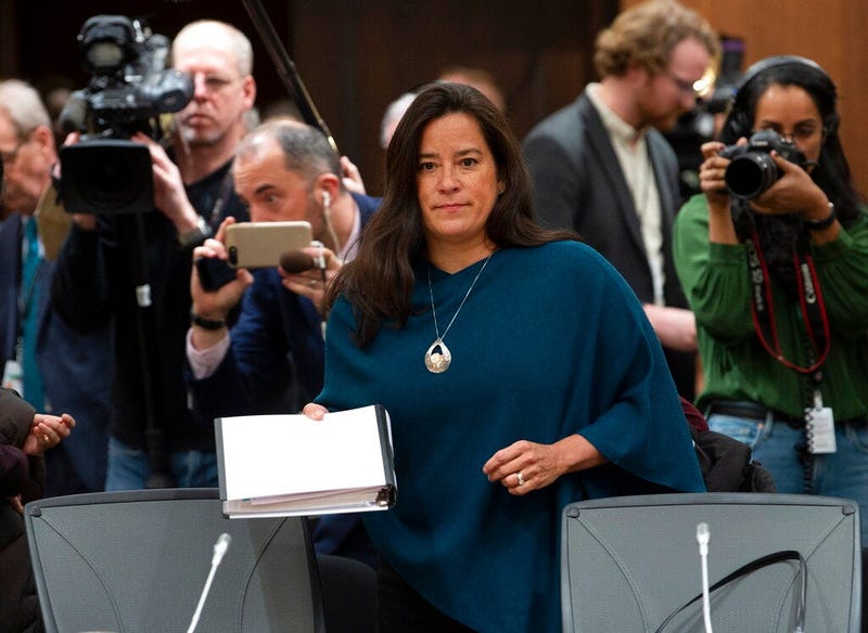 Cameras follow Jody Wilson Raybould as she waits to appear in front of the Justice committee in Ottawa, Wednesday February 27, 2019.